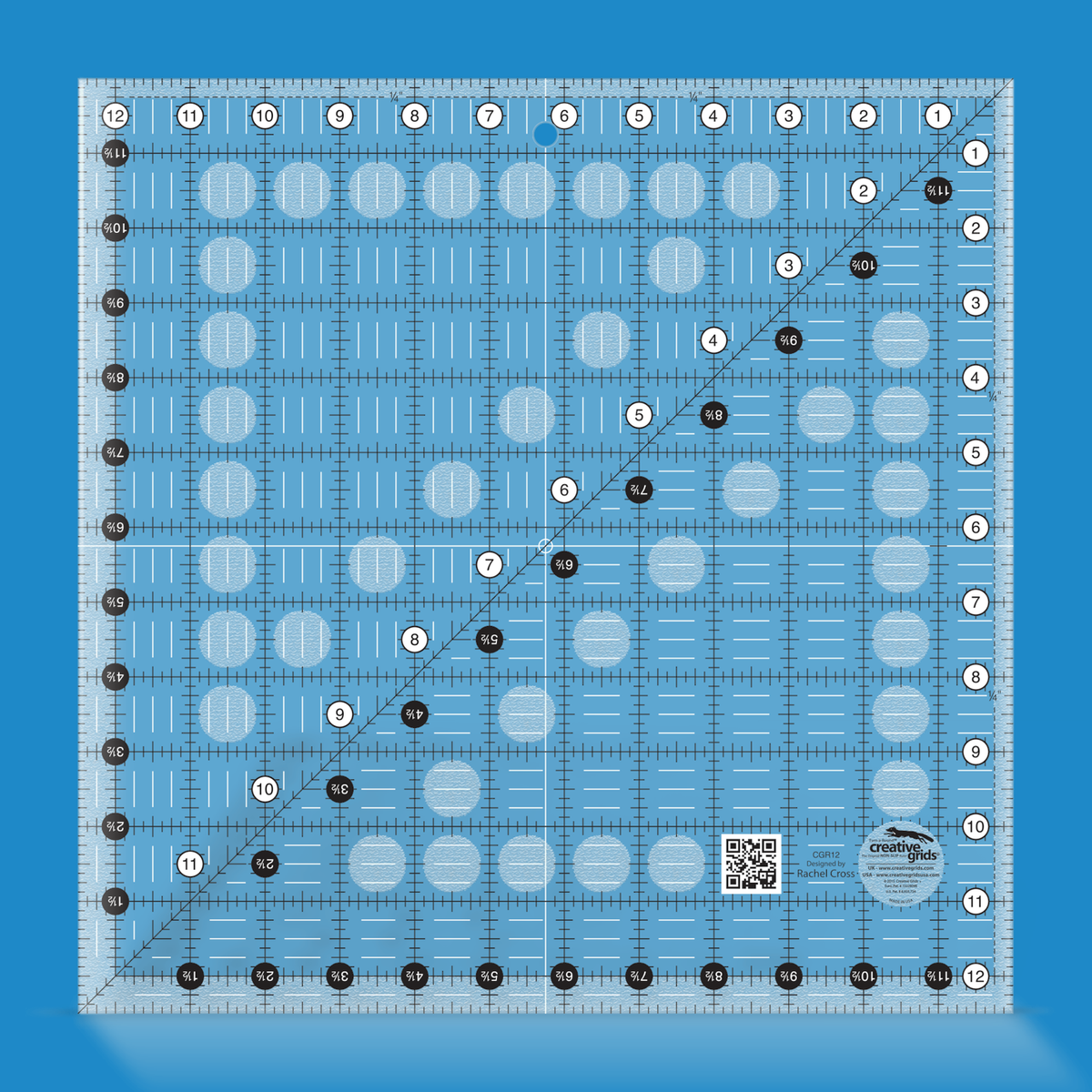 Creative Grids 12-1/2 inch square quilt ruler CGR12 by Rachel Cross rendered in translucent blue acrylic with black and white grid markings, whole-inch numbers in white dots, half-inch Turn-a-Round numbers in black dots, a 45 degree diagonal, a 1/4 inch dashed seam line, and white centering lines.