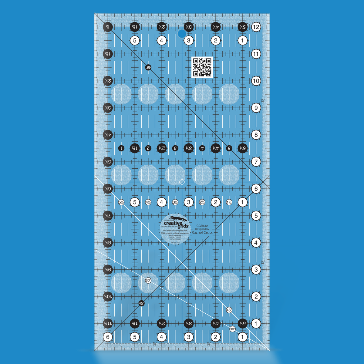 Creative Grids 6-1/2 x 12-1/2 inch rectangle quilt ruler CGR612 by Rachel Cross rendered in translucent blue acrylic with black and white grid markings, whole-inch numbers in white dots, half-inch Turn-a-Round numbers in black dots, crossed 45 degree lines, a 30/60 degree line, a 1/4 inch dashed seam line, and white centering lines.