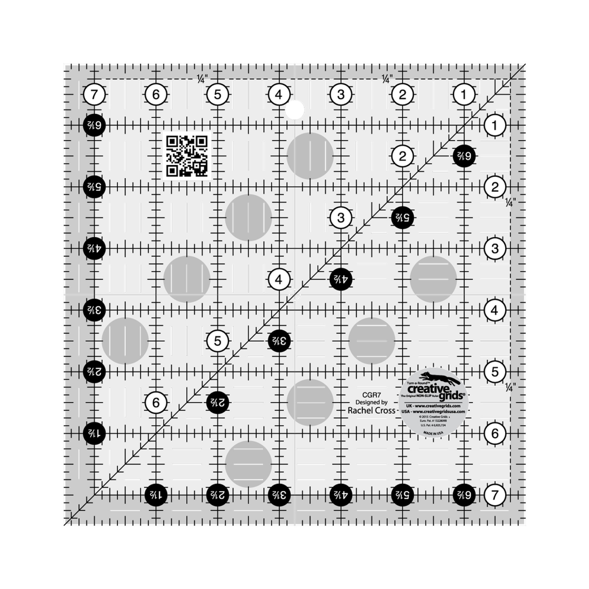 Creative Grids 7-1/2 inch square quilt ruler CGR7 by Rachel Cross, grayscale render on white: 1 inch grid with 1/8 inch tick marks, black numbers 1 to 7 in white dots on two edges, white half-inch numbers 1-1/2 to 6-1/2 in black dots on the other two, one 45 degree diagonal, 1/4 inch dashed seam line inside two edges, white centering lines, a QR code, gray non-slip grip dots, and the Creative Grids logo circle marked Made in USA.