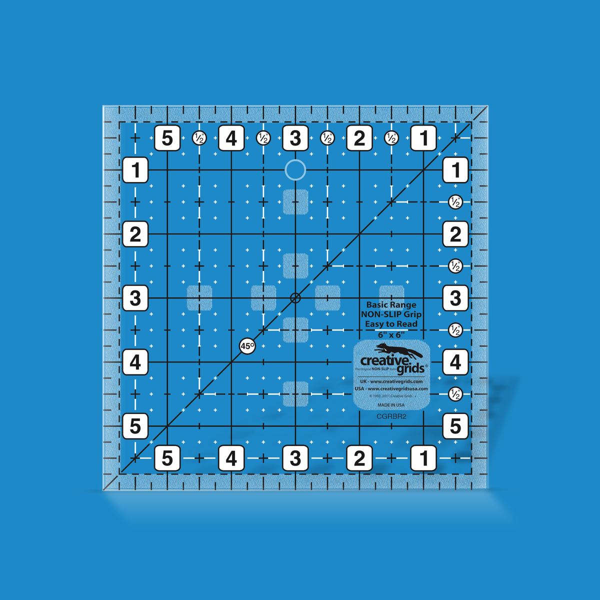 Creative Grids Basic Range 6-inch square quilt ruler CGRBR2 rendered in translucent blue acrylic with black and white grid markings, numbered edges, and a 45-degree diagonal line.