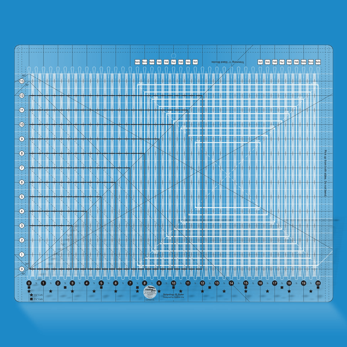 Stripology XL quilt ruler by Gudrun Erla for Creative Grids shown in translucent blue acrylic, highlighting the slotted cutting channels, star and square quick-reference markings for 1 1/2 inch and 2 1/2 inch strips, and the non-slip grip surface of the 17 3/4 x 22 inch ruler.