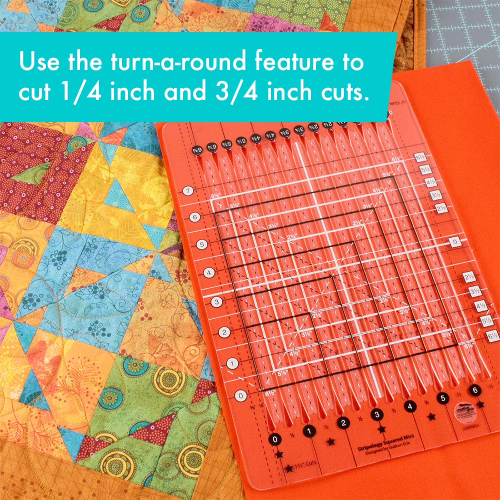 Stripology Squared Mini ruler in orange acrylic laid over a pieced quilt in progress, illustrating the turn-around feature used for 1/4 inch and 3/4 inch cuts.