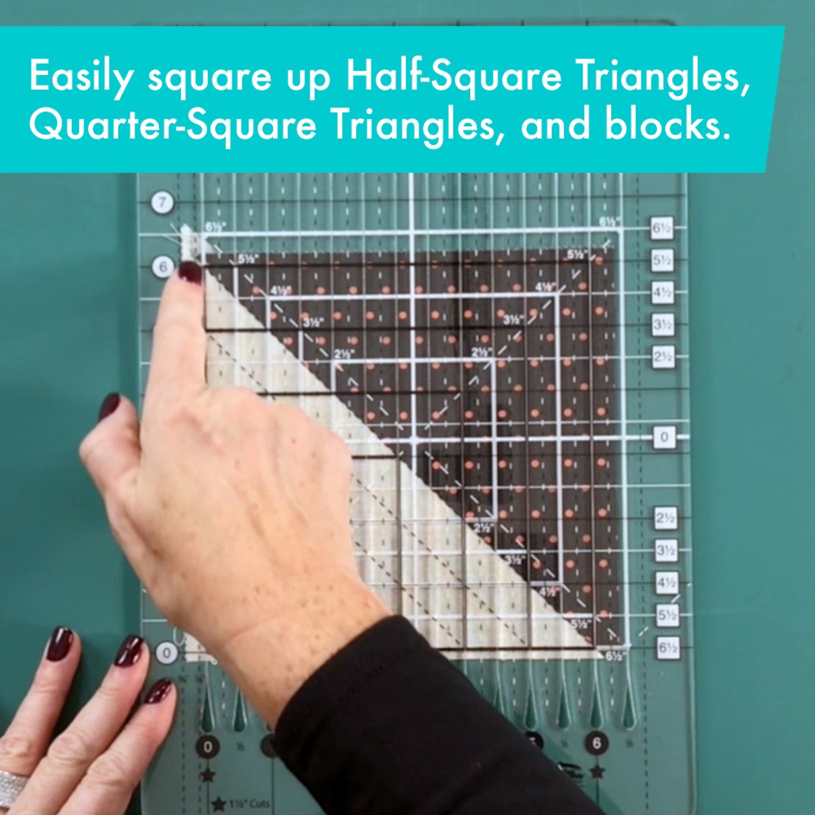 Stripology Squared Mini ruler in teal acrylic positioned over a fabric triangle unit on a cutting mat, demonstrating squaring up half-square and quarter-square triangle blocks.