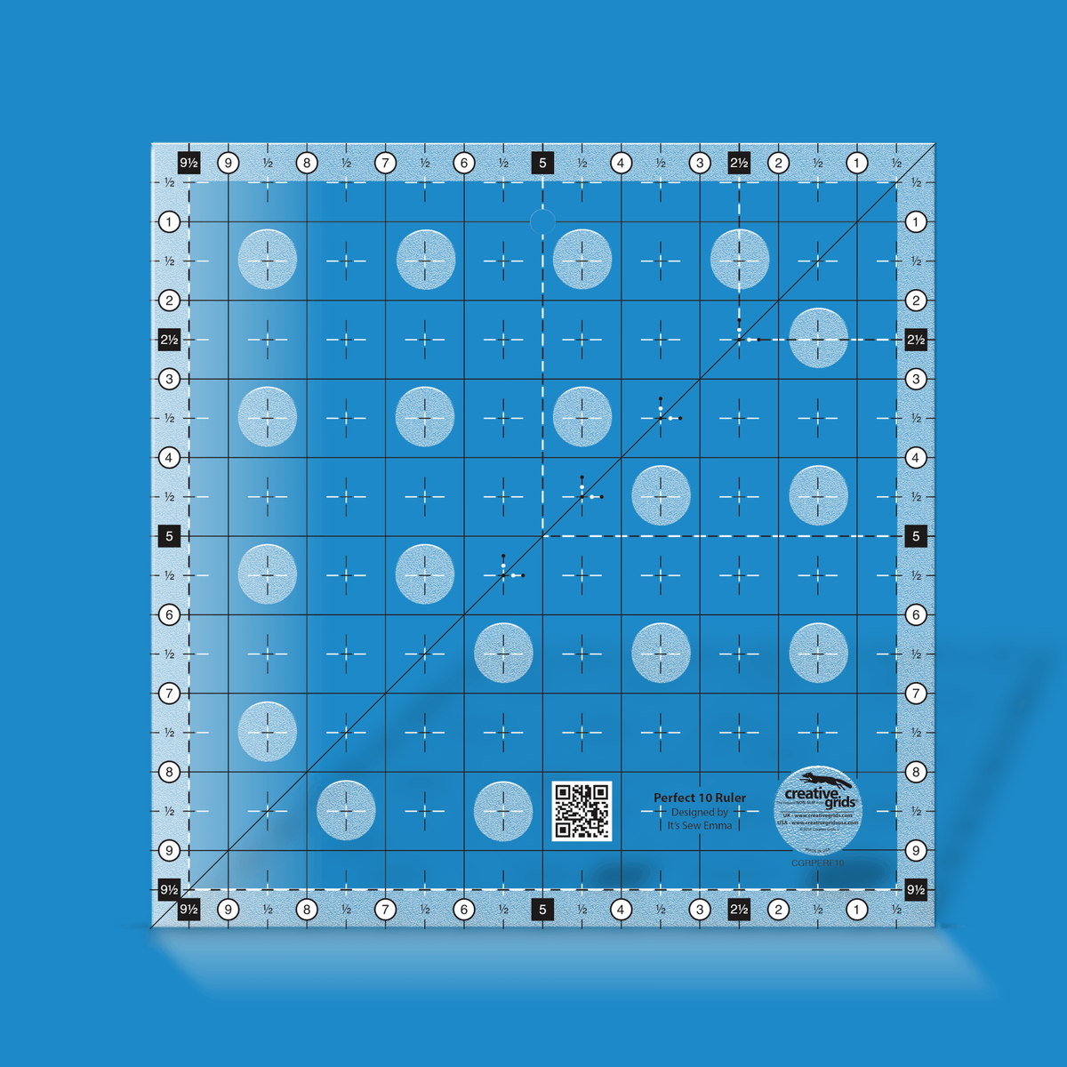 Creative Grids Perfect 10 Ruler CGRPERF10 by It's Sew Emma in translucent blue acrylic with inch lines numbered 1 to 9, half inch cross marks, black 2 1/2, 5, and 9 1/2 labels with dashed lines, a corner-to-corner diagonal line, QR code, and the Designed by It's Sew Emma credit.