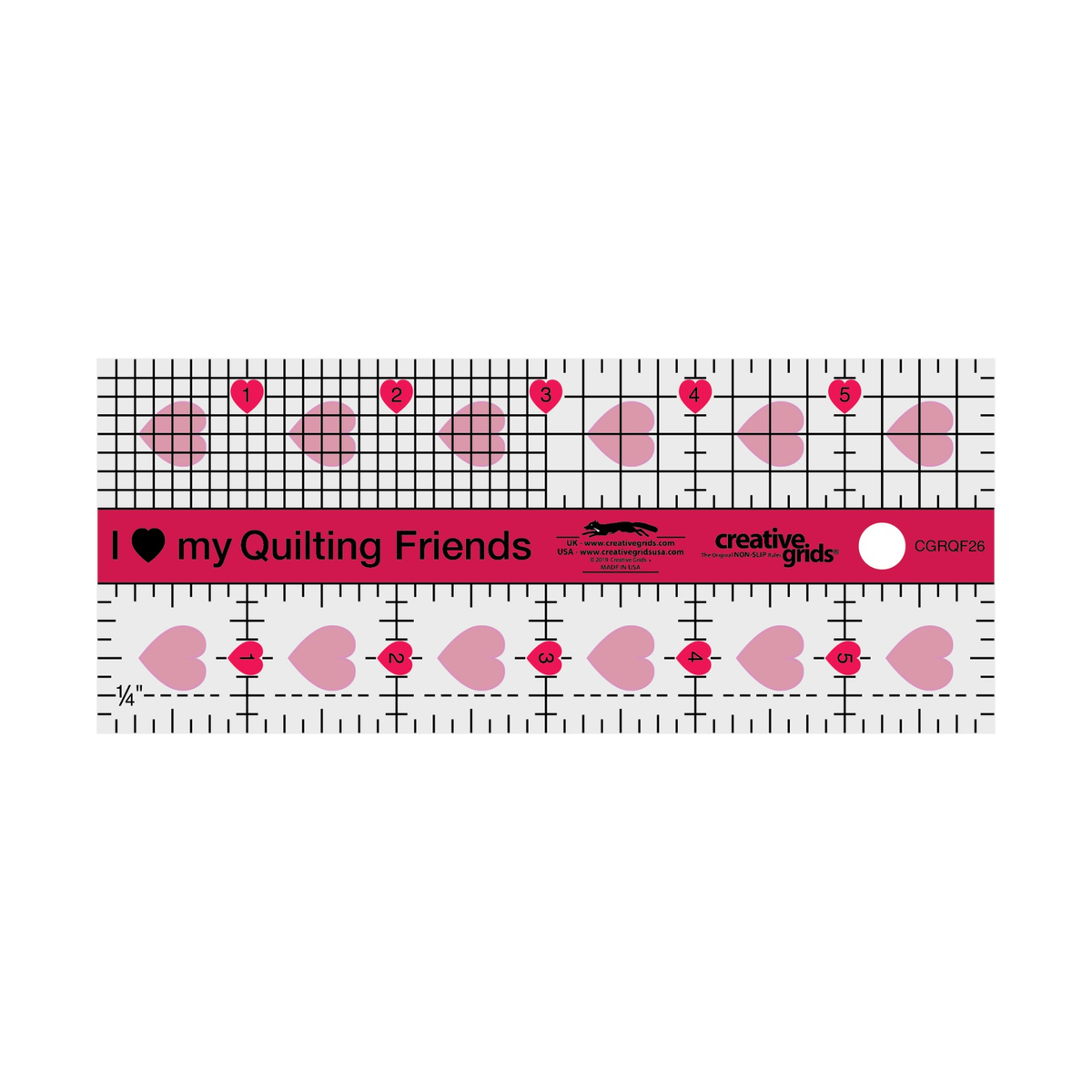 Creative Grids I Love My Quilt Friends Mini ruler CGRQF26 by Rachel Cross, 2 1/2 x 6 inch rectangle, render on white: a pink center band printed I heart my Quilting Friends with the Creative Grids logo and CGRQF26, a top row with a 1/8 inch grid on the left half and a 1/4 inch grid with tick marks on the right half, a bottom row with vertical lines at each inch, tick marks, and a dashed 1/4 inch line, inch numbers 1 to 5 in small pink hearts, pale pink hearts along both rows, and a hanging hole.