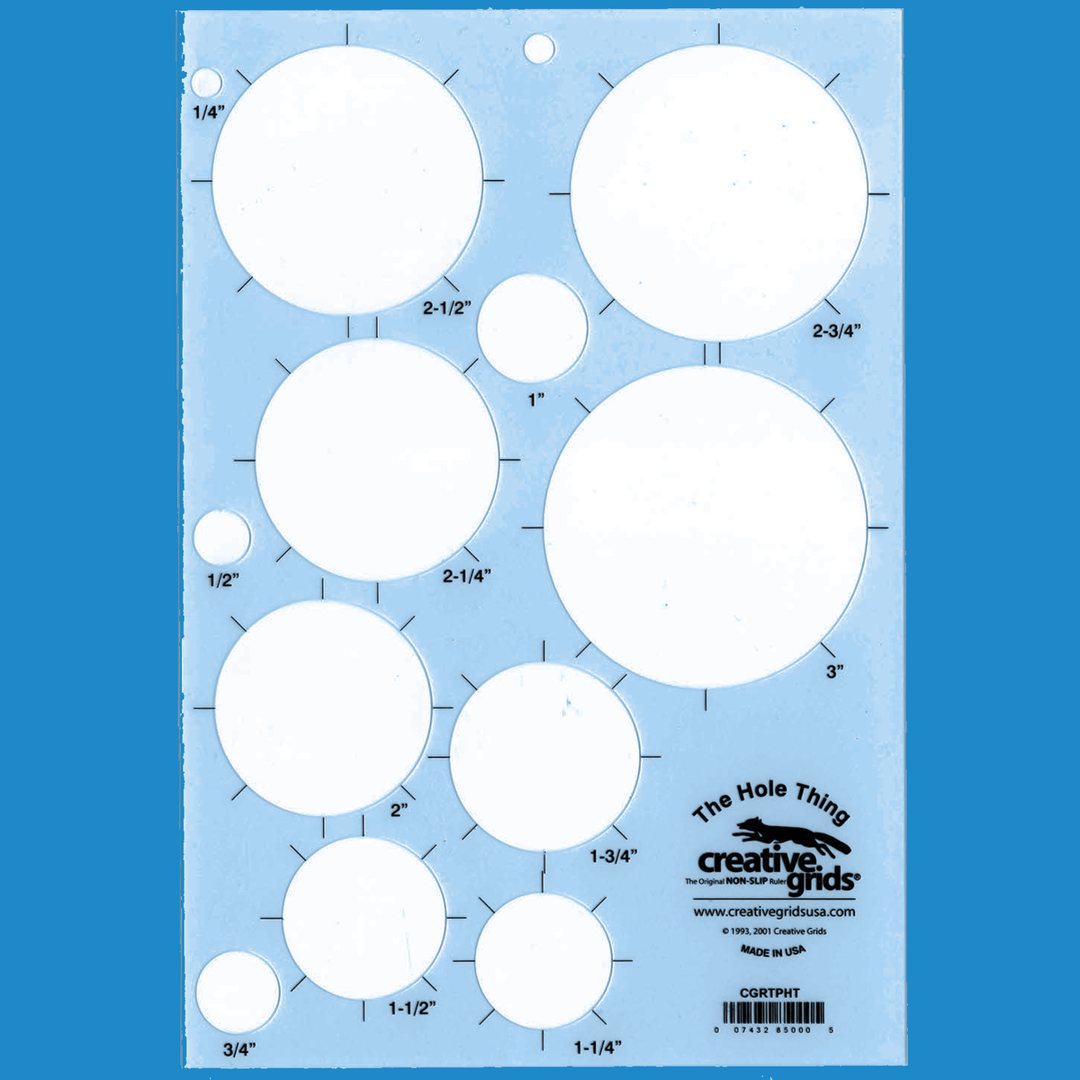 Creative Grids The Hole Thing Template CGRTPHT by Penny Haren, the plastic stencil recolored in light blue: twelve white cut-out circles from 1/4 inch to 3 inches, with printed size labels, tick marks around the larger circles, and The Hole Thing above the Creative Grids logo.