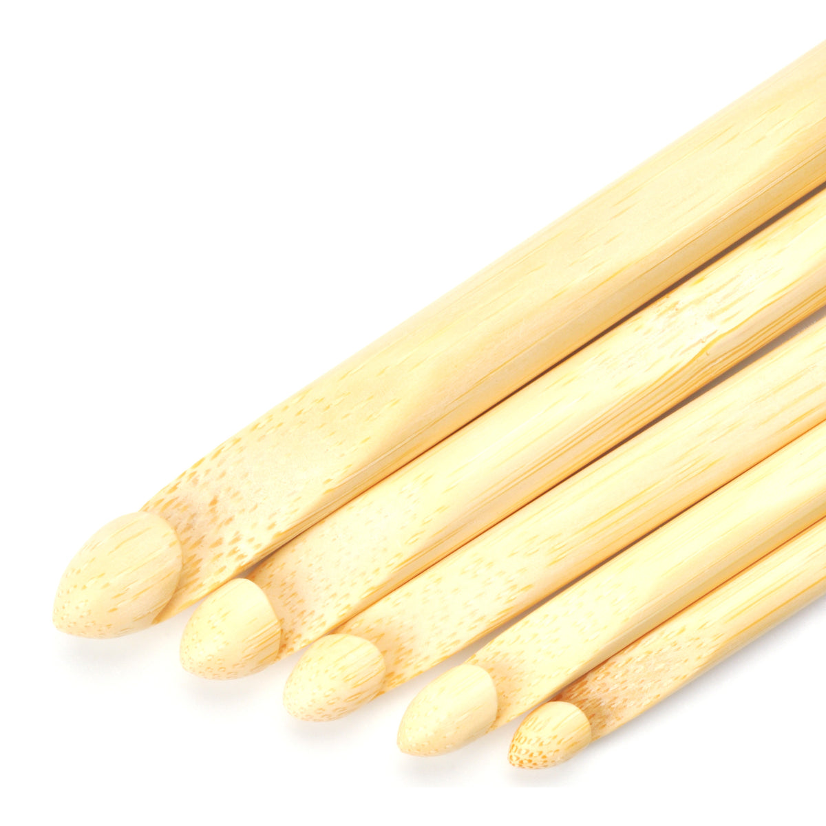 A row of ChiaoGoo bamboo crochet hooks in graduated sizes on a white background, with their rounded heads at the lower left. The natural bamboo is pale with a fine speckled grain.