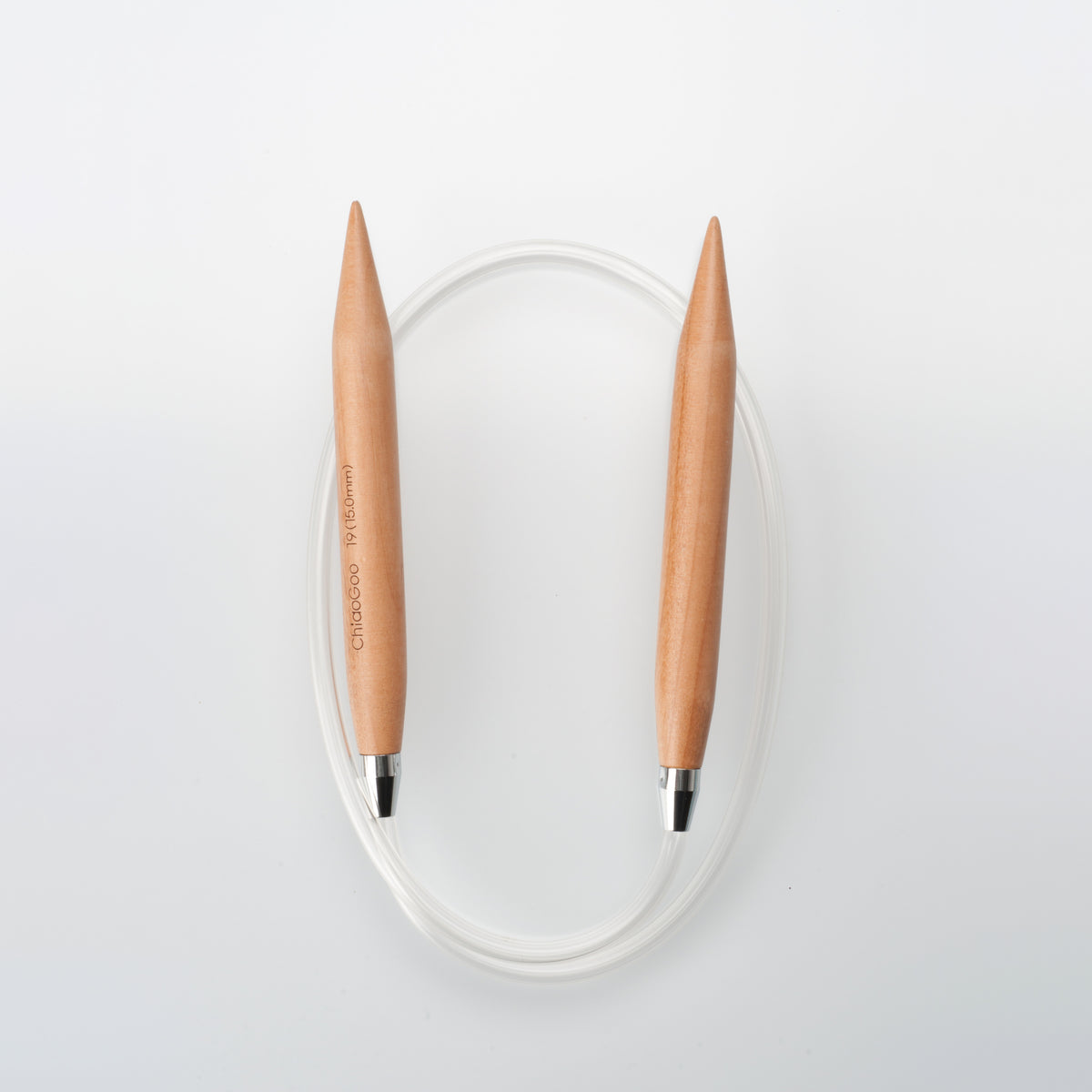 ChiaoGoo 32-inch wood circular knitting needle in a large size on a light gray background. Two thick wood tips stand upright with the points up, and a clear cable loops between their metal joins. A marking on one tip reads ChiaoGoo 19 (15.0mm).