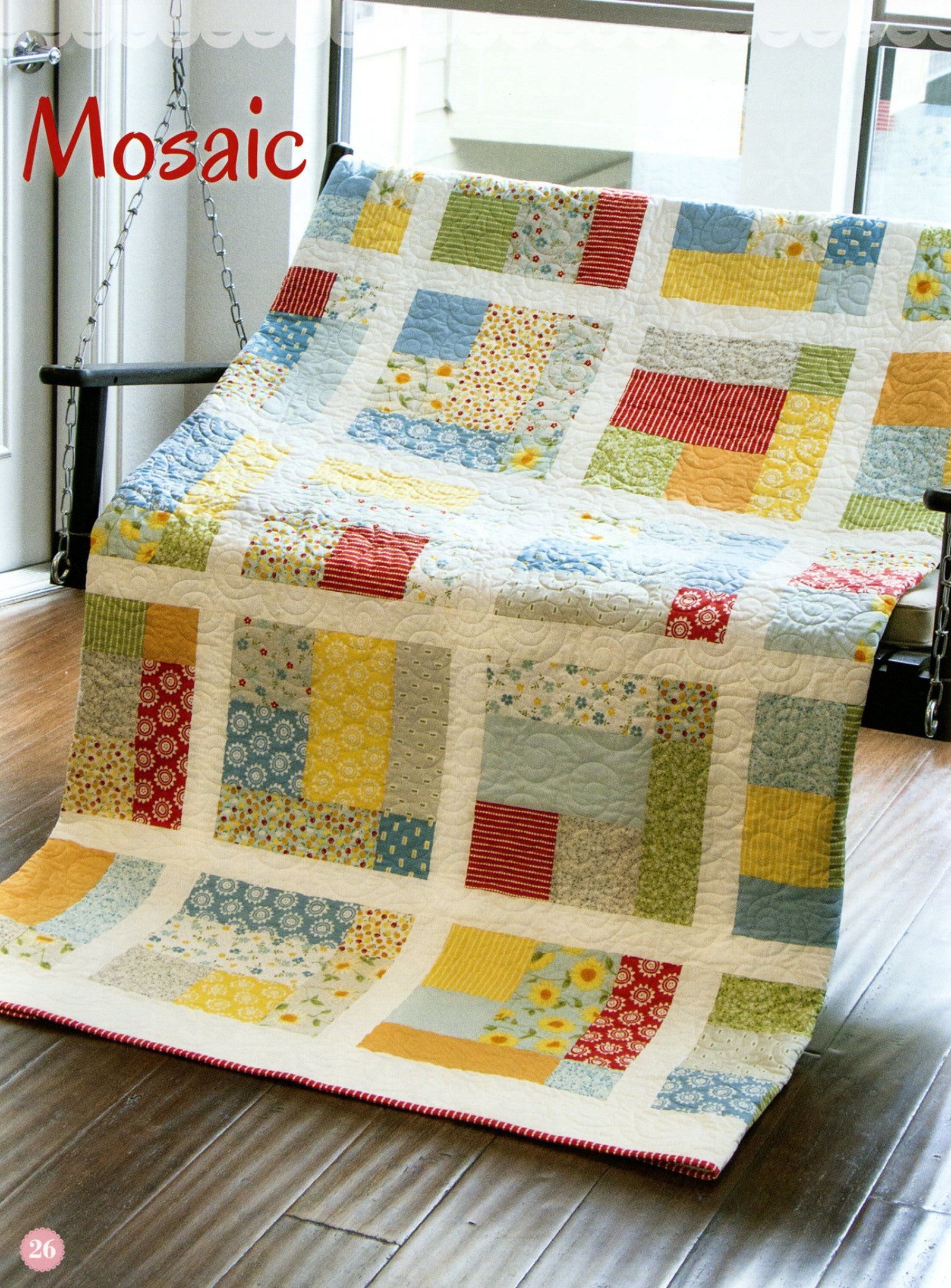Mosaic quilt from the Fat Quarter Style pattern book, a scrappy squares quilt in soft multicolor fat quarter prints.