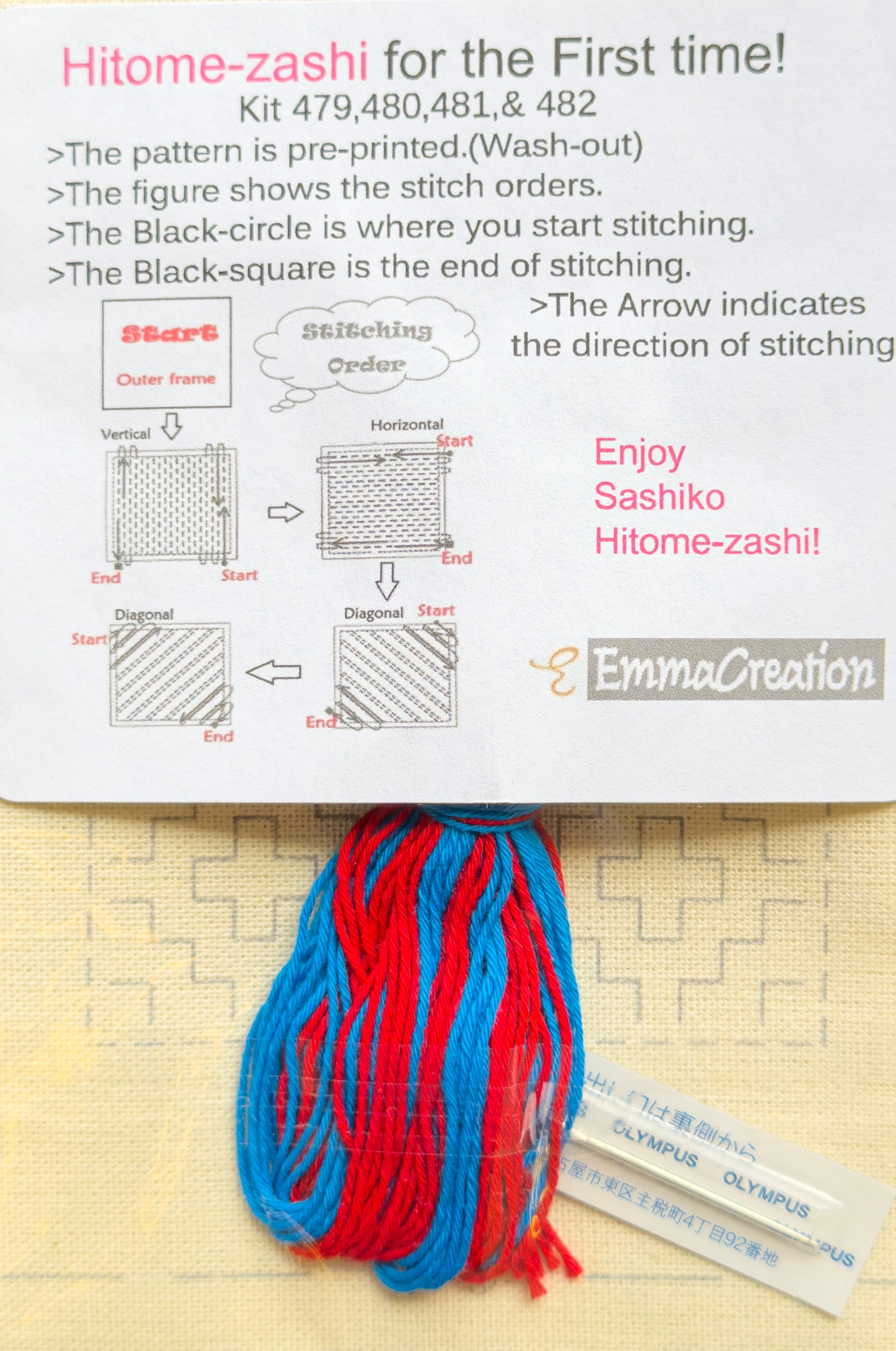 Contents of the Olympus hitomezashi sashiko coaster kit SK-0481 Kaki-No-Hana Ecru from EmmaCreation: skeins of red and blue sashiko thread and an Olympus sashiko needle rest on the ecru (natural unbleached) preprinted cloth, its kaki-no-hana persimmon flower design showing in wash-out ink, beneath the EmmaCreation starter card diagramming the vertical, horizontal, and diagonal stitching order.
