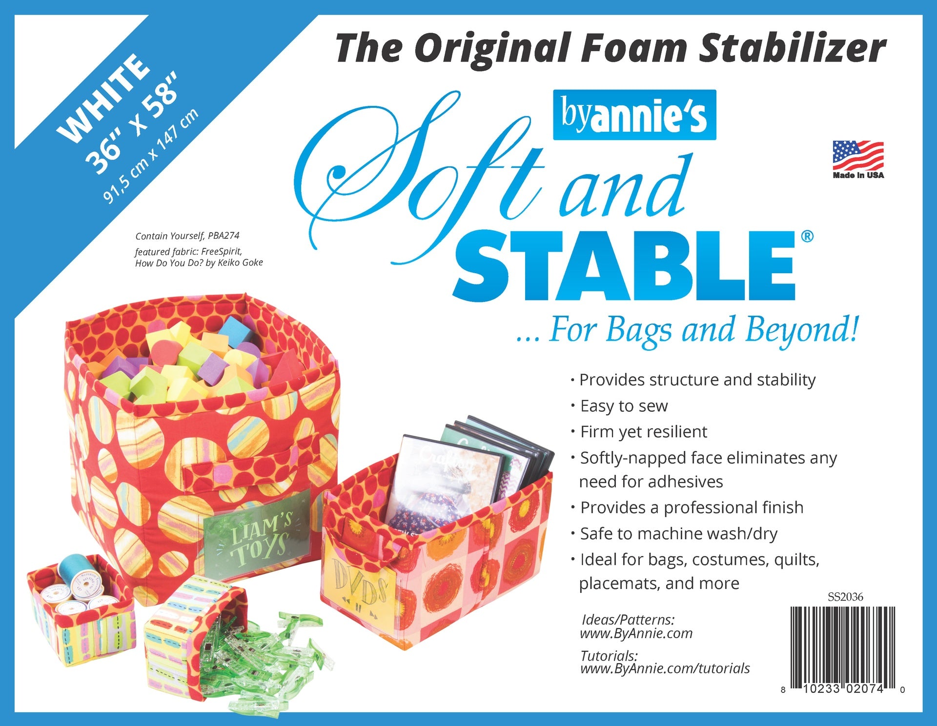 ByAnnie's Soft and Stable label for the white 36 inch by 58 inch cut, reading The Original Foam Stabilizer, with red fabric storage bins and boxes holding toys, DVDs, and thread spools.