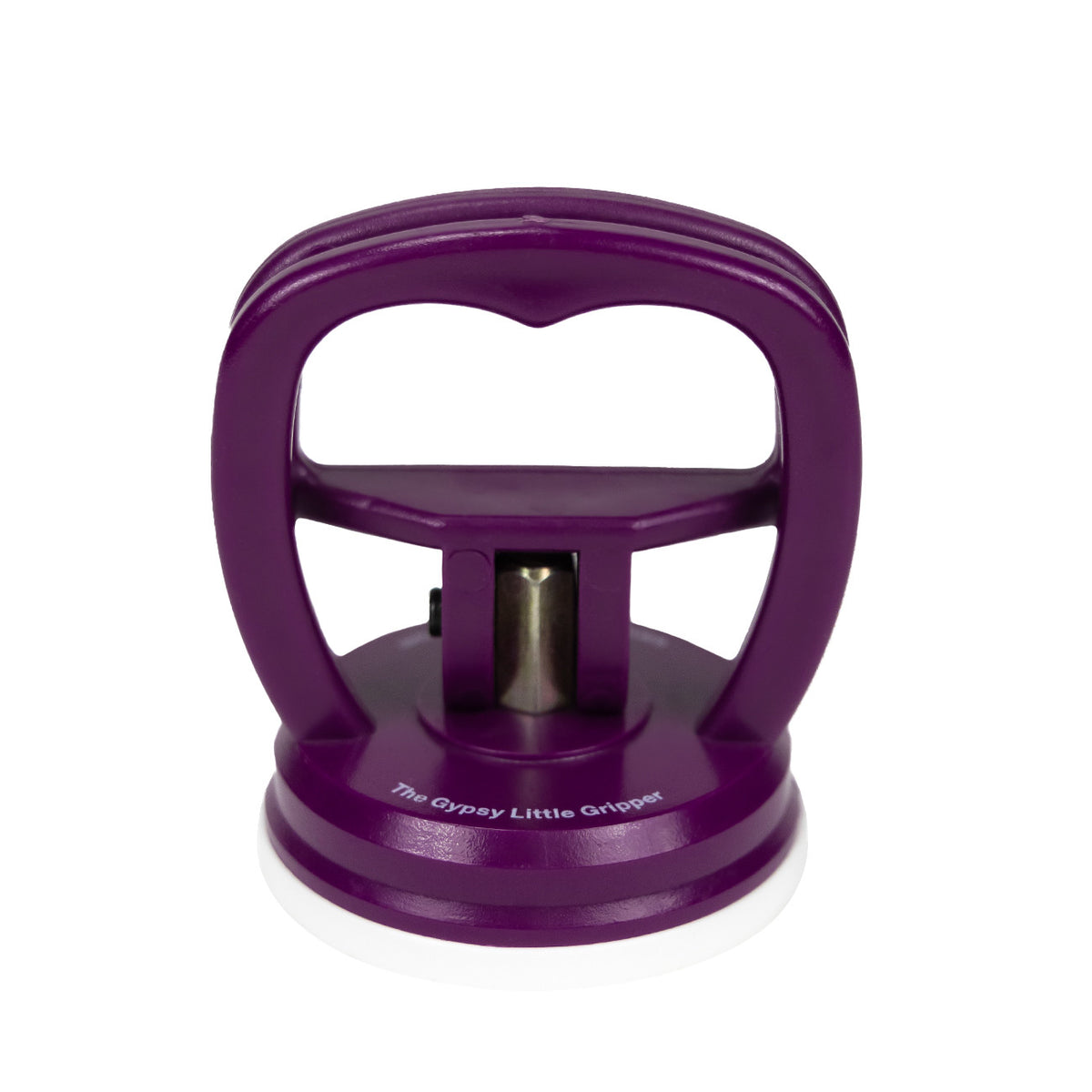 The Amazing Little Gripper by The Gypsy Quilter, a purple arched handle above a round suction cup with a white base, The Gypsy Little Gripper printed on the rim.