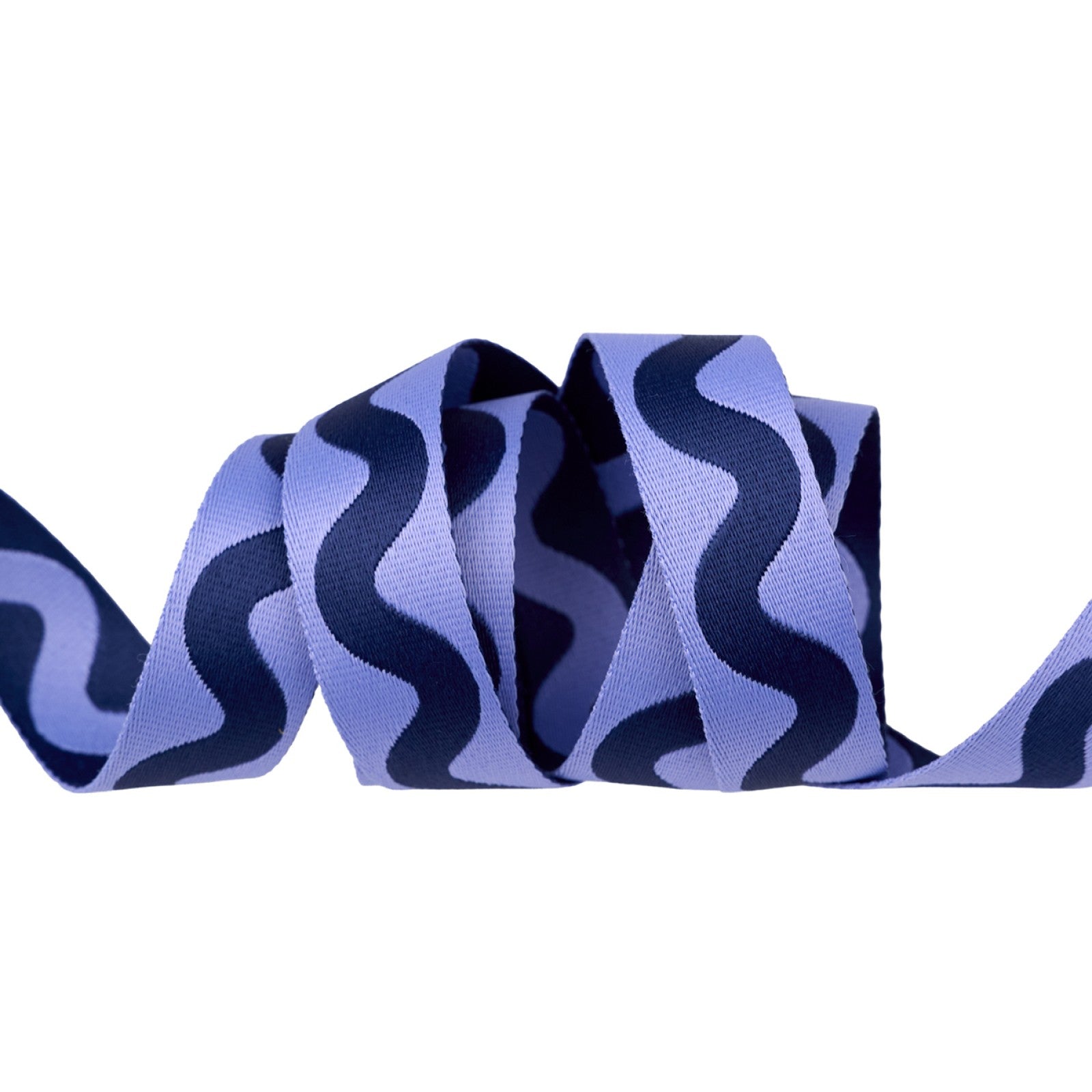 Tula Pink Floral Reef Lil Squiggle webbing in Marine from Renaissance Ribbons, a 1 inch woven polyester strap twisting on white to show a navy squiggle on cornflower blue and the reverse, blue on navy.