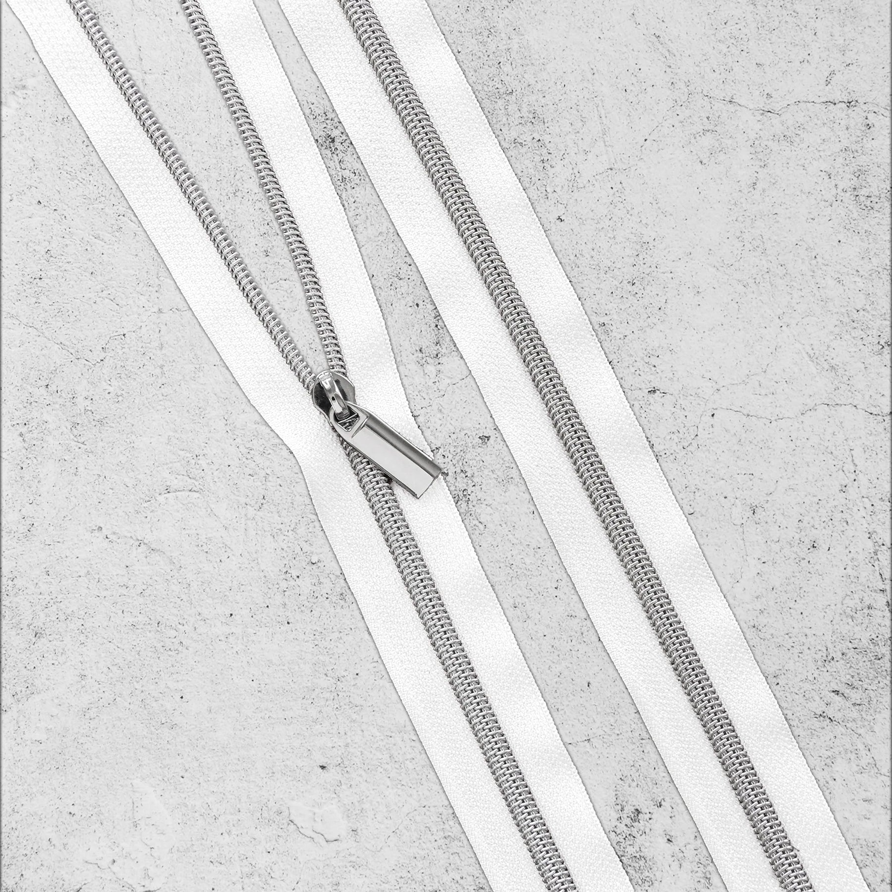 White #5 Nylon Nickel Coil Zippers: 3 Yards with 9 Pulls from Sallie Tomato