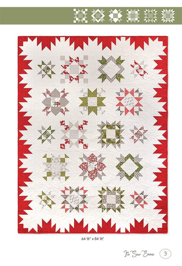 Full view of the Among the Stars Again sampler quilt in the Christmas colorway, star blocks in reds, greens, and grays inside a red sawtooth border, finishing at 64-1/2 x 84-1/2 inches.