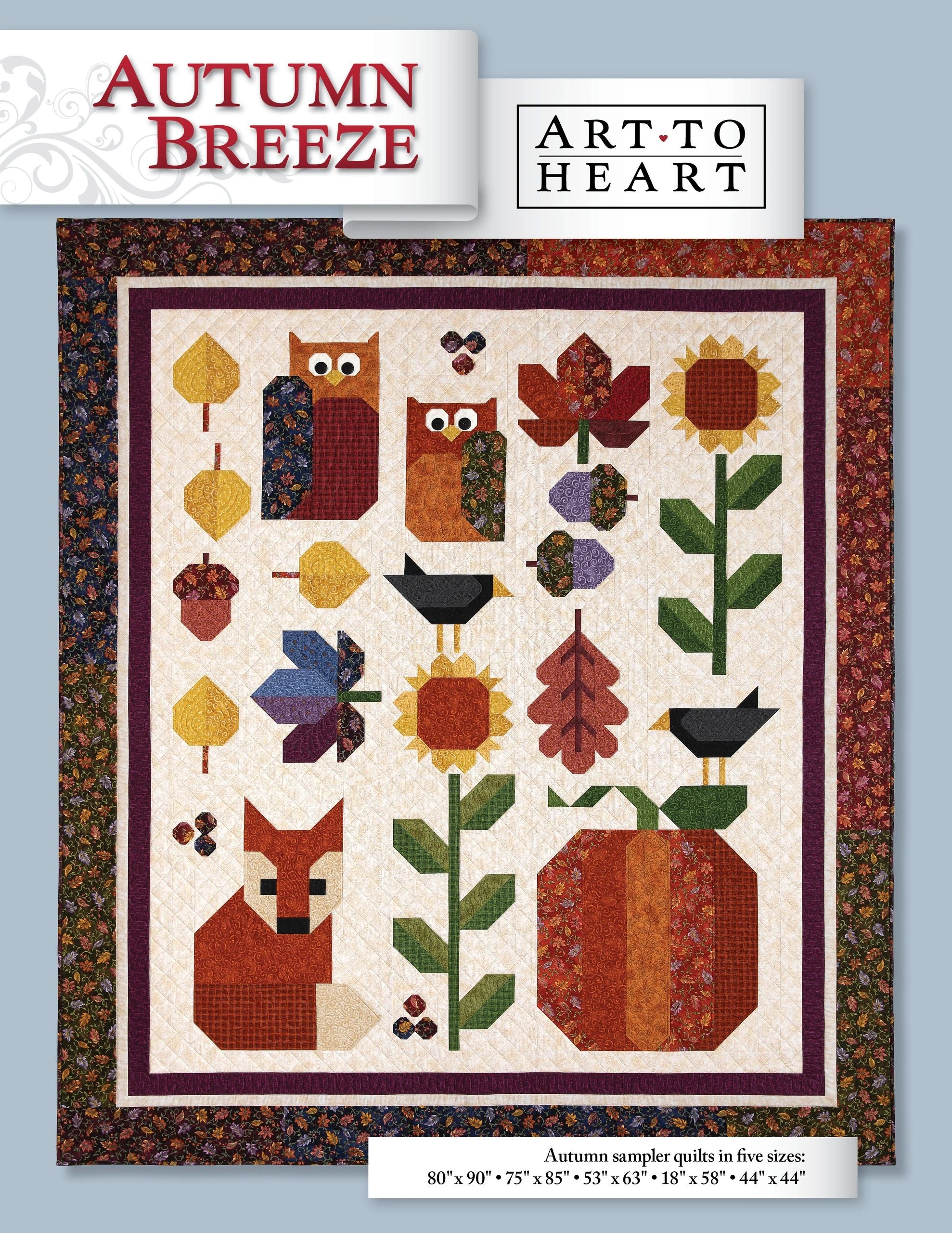 Front cover of the Autumn Breeze quilt pattern book by Nancy Halvorsen of Art to Heart, showing the Autumn Breeze sampler quilt: pieced and applique owls, a fox, sunflowers, fall leaves, acorns, blackbirds, and a large pumpkin in warm reds, golds, and greens on a cream background with a dark autumn-print border. Text lists five finished sizes.