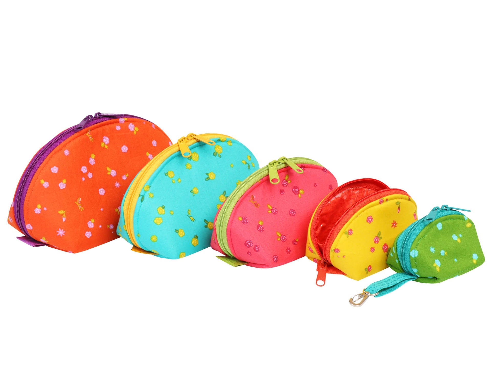 Five Clam Up pouches in graduated sizes lined up from extra small to extra large.