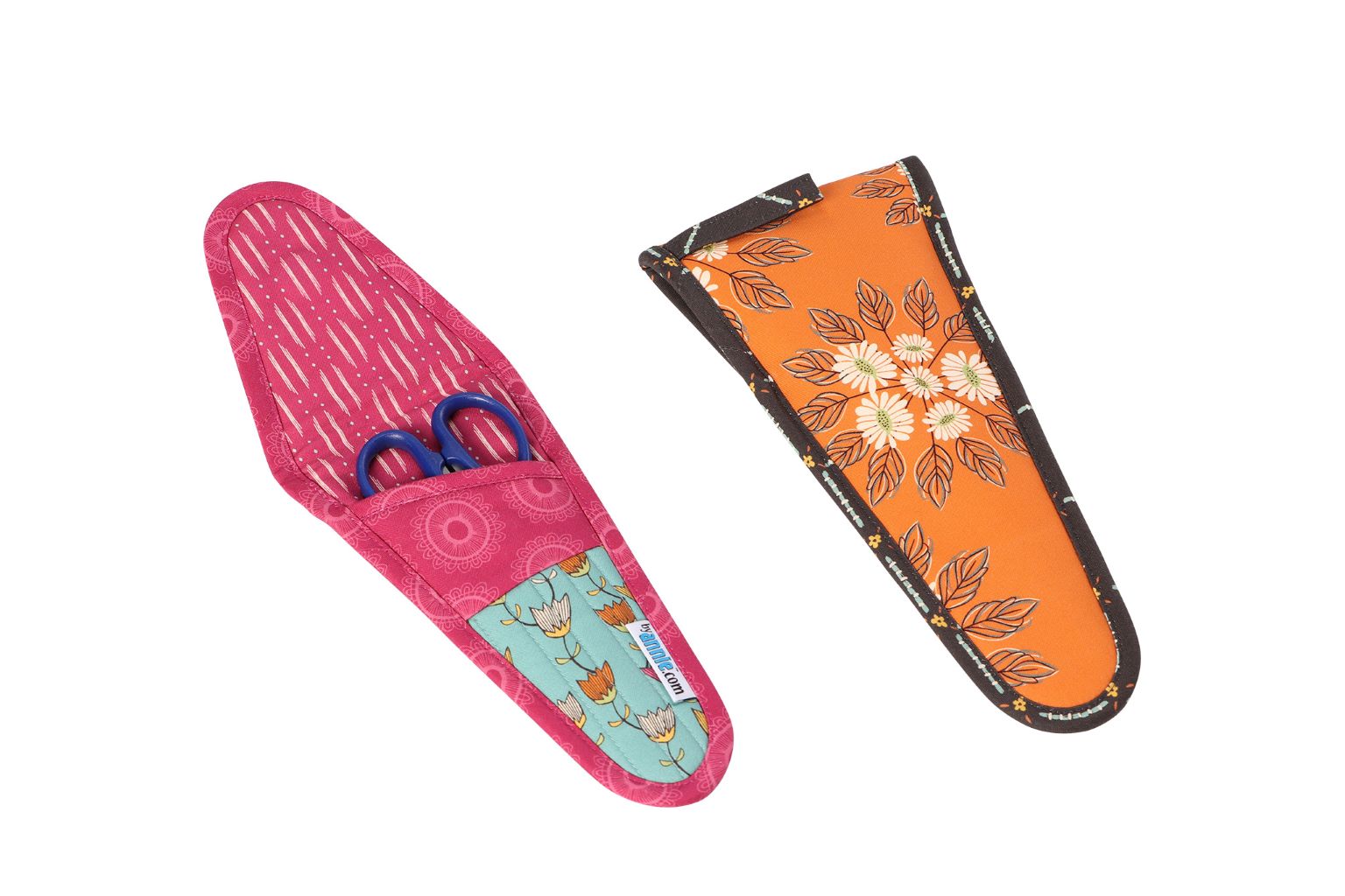 Two Cut It Out scissors cases, one open to show scissors and snips tucked inside the padded case.