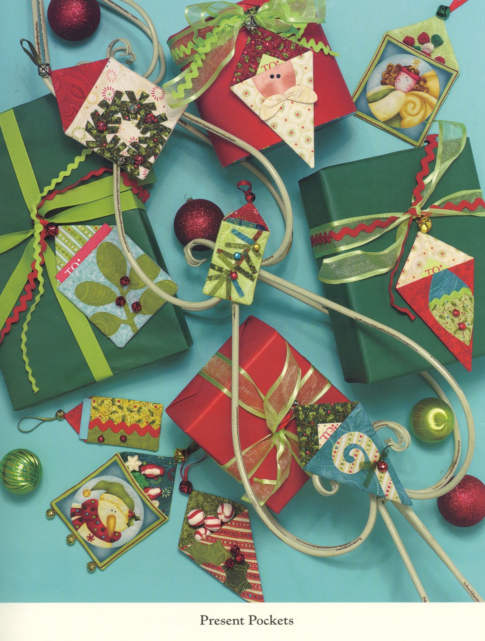 Interior page of the Jingle All The Way quilt pattern book by Nancy Halvorsen of Art to Heart, showing Pocket Presents, small fabric pockets tied to wrapped gifts.