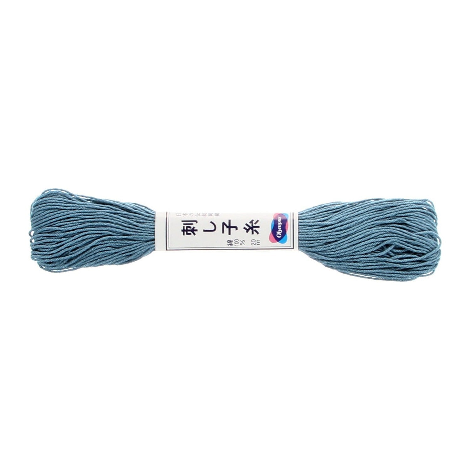 Olympus sashiko thread in sky blue, a 22-yard skein of dusty sky-blue matte cotton thread lying horizontally in the printed Olympus paper band, on a white background.