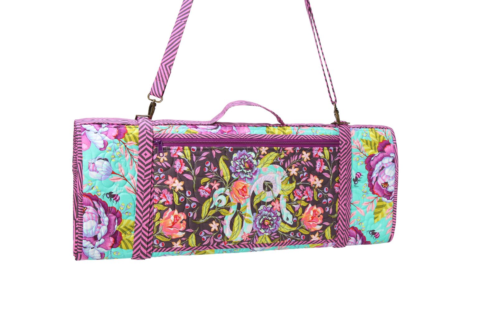 A Ruler Wrap folded closed with a top handle and an adjustable shoulder strap.