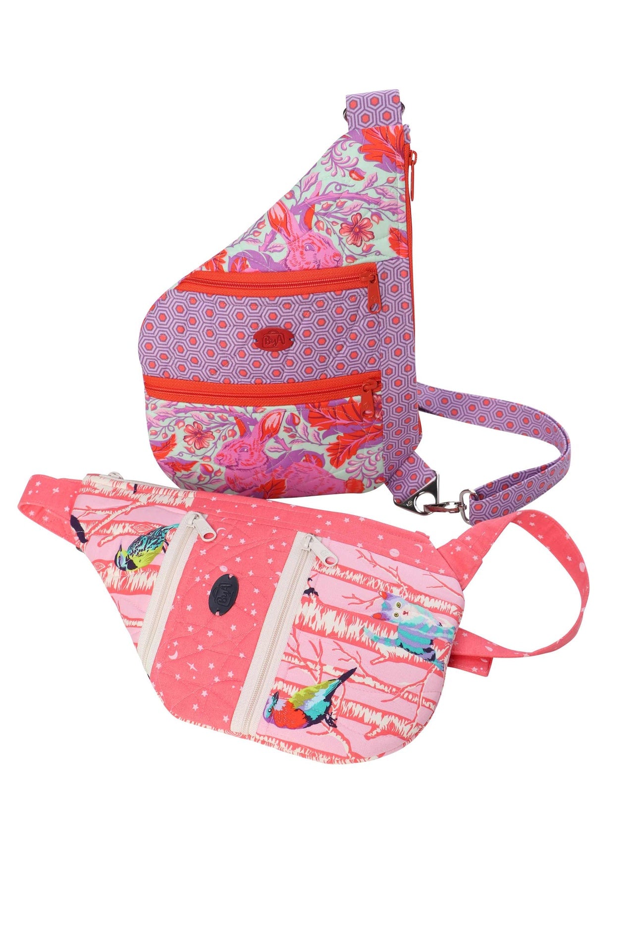 A small and a standard Side Hustle sling bag shown together to compare the two sizes.