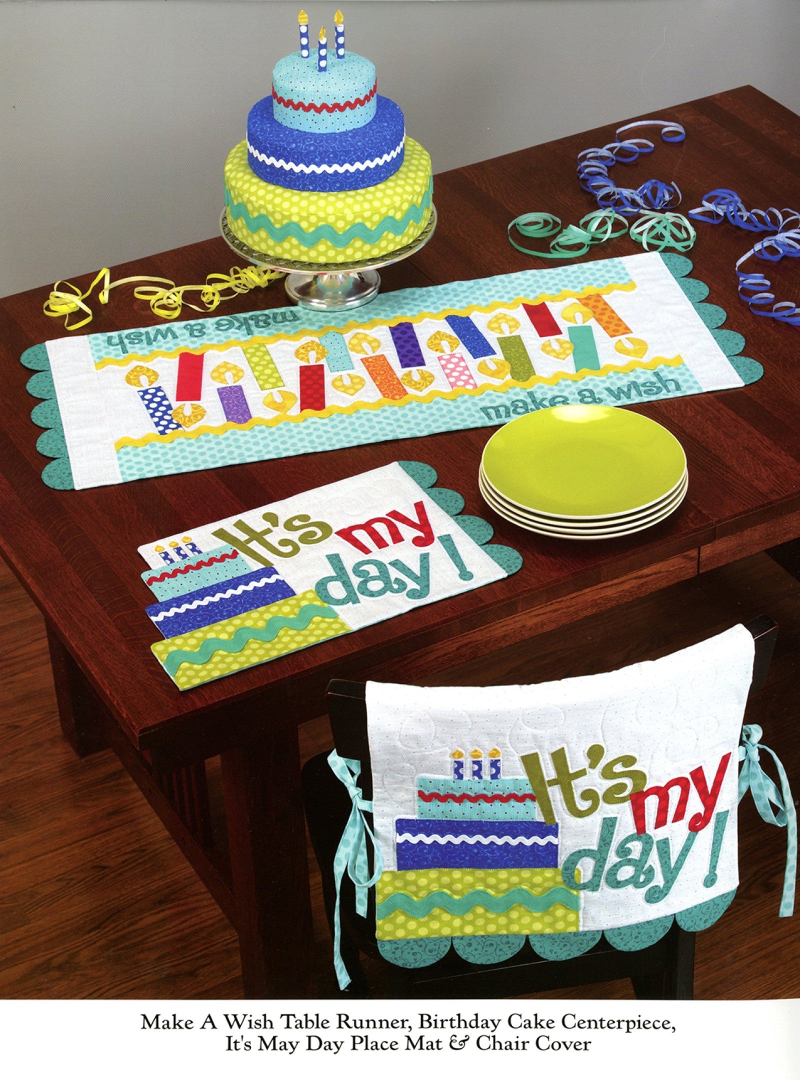 Interior page of the Table Please Part One quilt pattern book by Nancy Halvorsen of Art to Heart, showing the Make A Wish table runner, Birthday Cake centerpiece, and It's My Day place mat and chair cover.