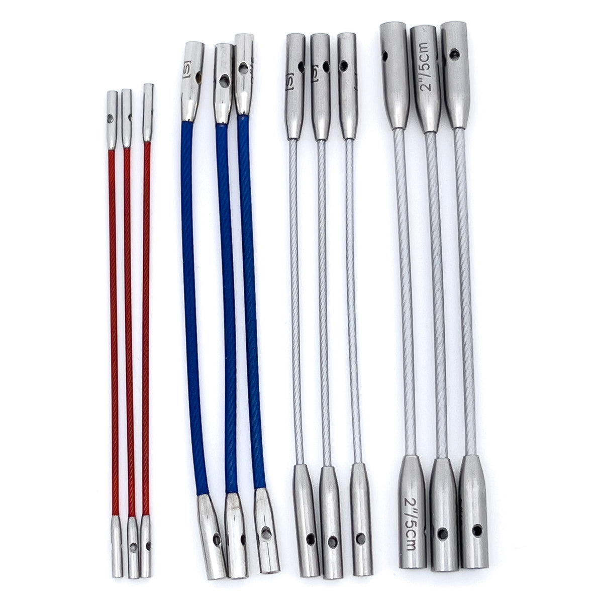 Four kinds of ChiaoGoo 2-inch (5 cm) interchangeable knitting needle cables side by side on a white background, three of each kind. From left: red TWIST cables with Mini joins, blue X-Flex cables with Small joins, silver SWIV360 cables with Small joins, and silver SWIV360 cables with Large joins. Every cable has a metal join with a small hole at each end.