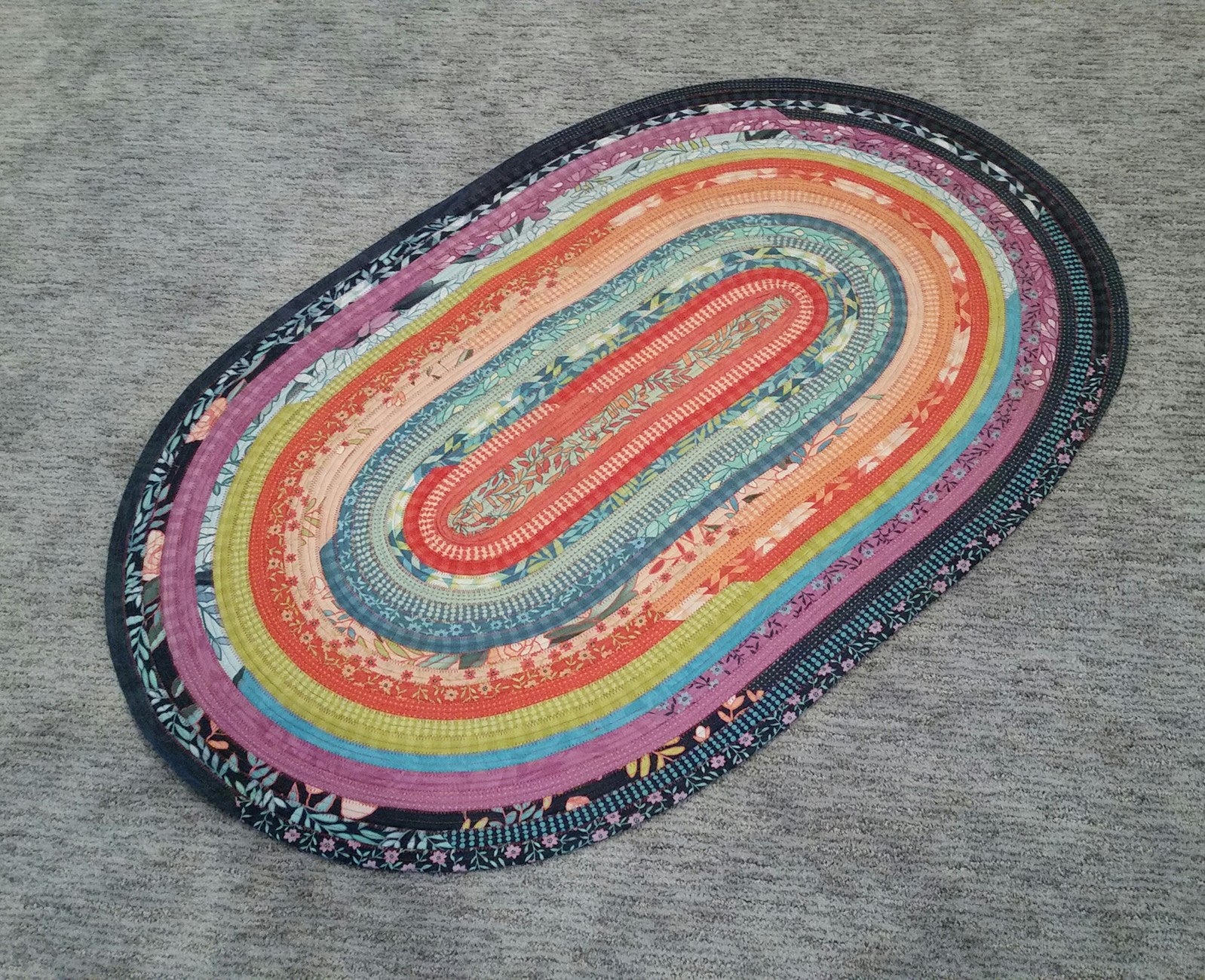 Jelly Roll Rug Oval 30-Inch x 44-Inch and More Sewing Pattern by Roma Lambson of RJ Designs