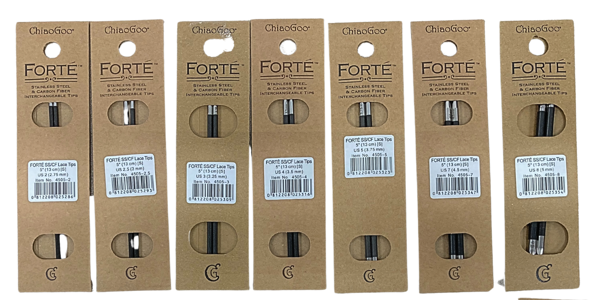 Seven packages of ChiaoGoo FORTÉ 5-inch stainless steel and carbon fiber interchangeable knitting needle tips with the Small [S] join, in a row on a gray background: US-2 (2.75 mm), US-2.5 (3 mm), US-3 (3.25 mm), US-4 (3.5 mm), US-5 (3.75 mm), US-7 (4.5 mm), and US-8 (5 mm). Each kraft paper card reads ChiaoGoo FORTÉ Stainless Steel & Carbon Fiber Interchangeable Tips, with two windows showing the pair of tips and a white label giving the size and item number.