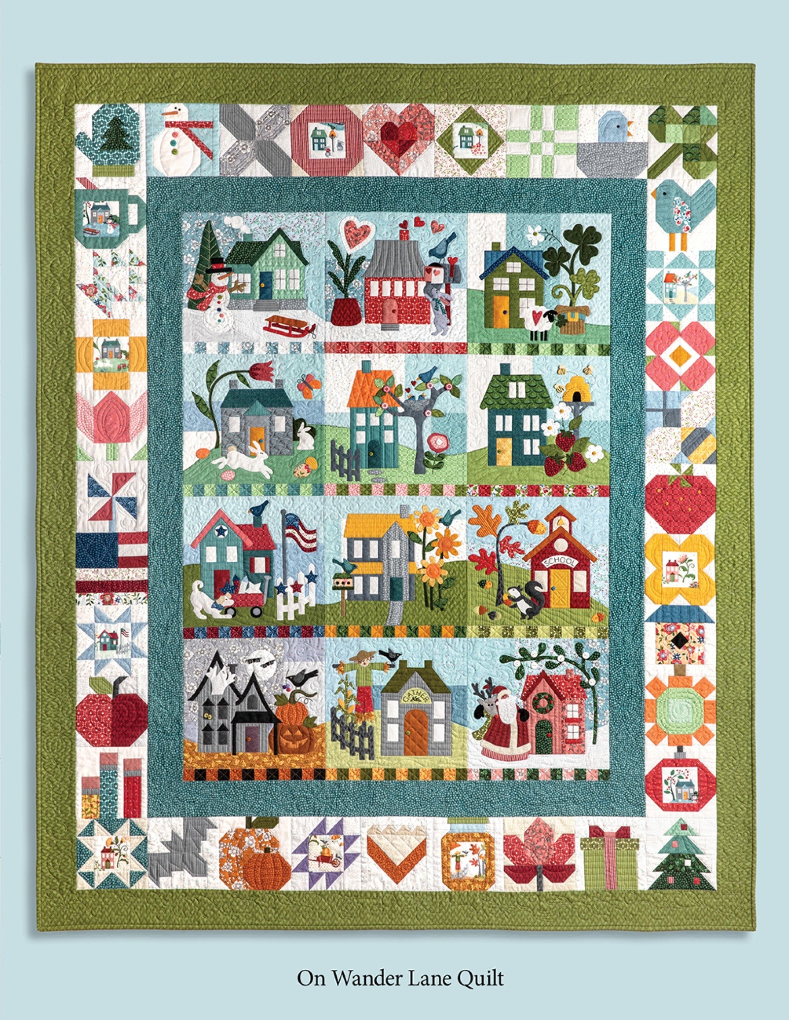 The complete On Wander Lane quilt with all twelve monthly appliqué blocks joined into one 60 by 72 inch sampler quilt by Nancy Halvorsen.