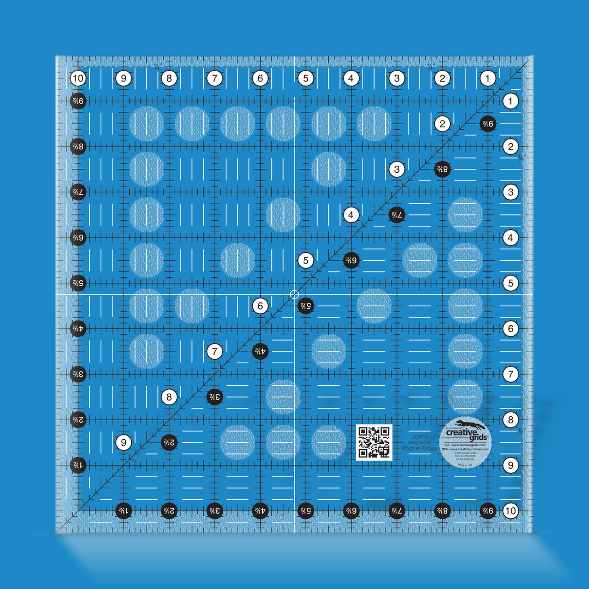 Creative Grids 10-1/2 inch square quilt ruler CGR10 by Rachel Cross rendered in translucent blue acrylic with black and white grid markings, whole-inch numbers in white dots, half-inch Turn-a-Round numbers in black dots, a 45 degree diagonal, a 1/4 inch dashed seam line, and white centering lines.