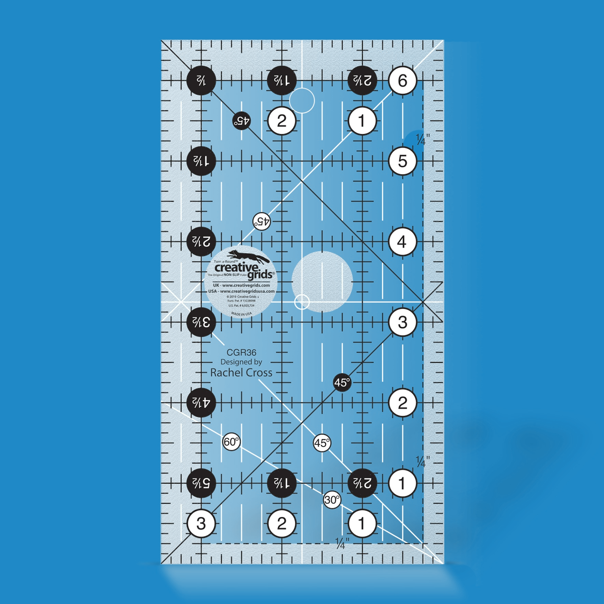 Creative Grids 3-1/2 x 6-1/2 inch rectangle quilt ruler CGR36 by Rachel Cross rendered in translucent blue acrylic with black and white grid markings, whole-inch numbers in white dots, half-inch Turn-a-Round numbers in black dots, crossed 45 degree lines, a 30/60 degree line, a 1/4 inch dashed seam line, and white centering lines.