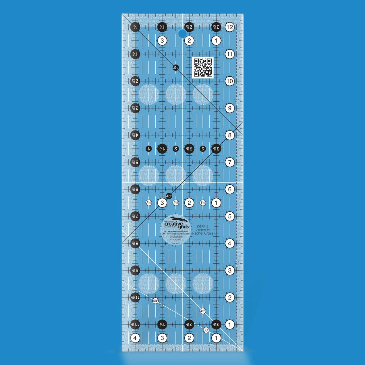Creative Grids 4-1/2 x 12-1/2 inch rectangle quilt ruler CGR412 by Rachel Cross rendered in translucent blue acrylic with black and white grid markings, whole-inch numbers in white dots, half-inch Turn-a-Round numbers in black dots, crossed 45 degree lines, a 30/60 degree line, a 1/4 inch dashed seam line, and white centering lines.