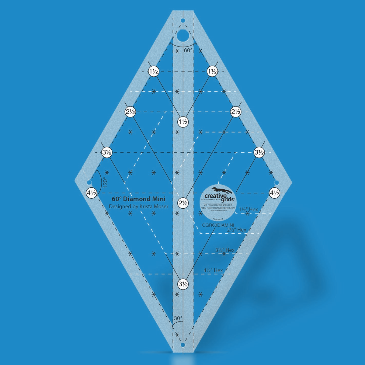 Creative Grids 60 Degree Mini Diamond CGR60DIAMINI by Krista Moser in translucent blue acrylic, diamond shape with circled labels 1 1/2 to 4 1/2 along the upper edges, solid angled lines, dashed horizontal lines, 60, 120, and 30 degree angle labels, Hex outlines, asterisk marks, and the Designed by Krista Moser credit.
