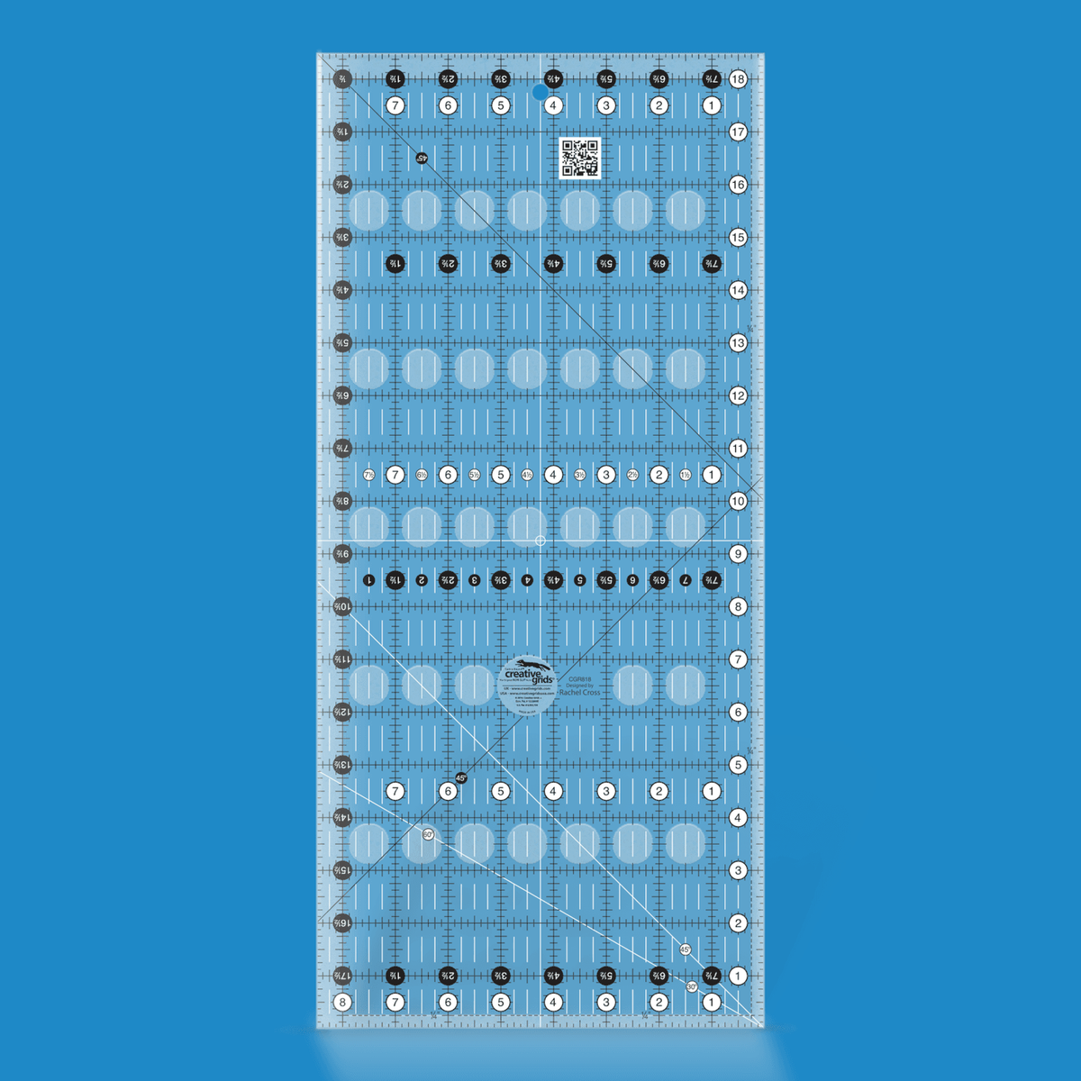 Creative Grids 8-1/2 x 18-1/2 inch rectangle quilt ruler CGR818 by Rachel Cross rendered in translucent blue acrylic with black and white grid markings, whole-inch numbers in white dots, half-inch Turn-a-Round numbers in black dots, crossed 45 degree lines, a 30/60 degree line, a 1/4 inch dashed seam line, and white centering lines.