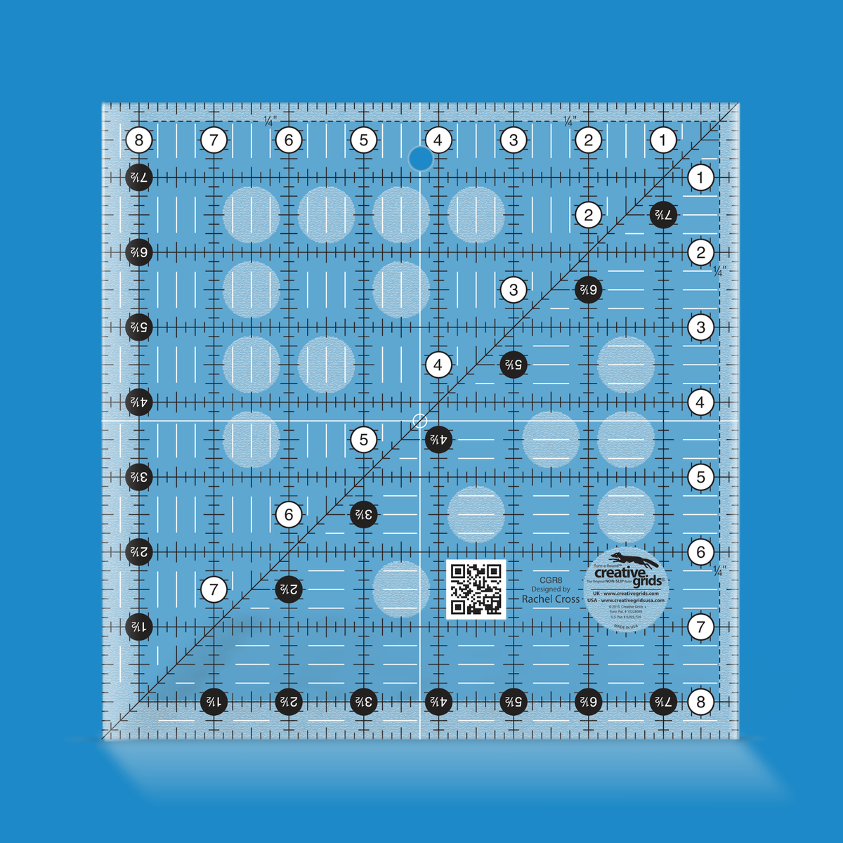 Creative Grids 8-1/2 inch square quilt ruler CGR8 by Rachel Cross rendered in translucent blue acrylic with black and white grid markings, whole-inch numbers in white dots, half-inch Turn-a-Round numbers in black dots, a 45 degree diagonal, a 1/4 inch dashed seam line, and white centering lines.