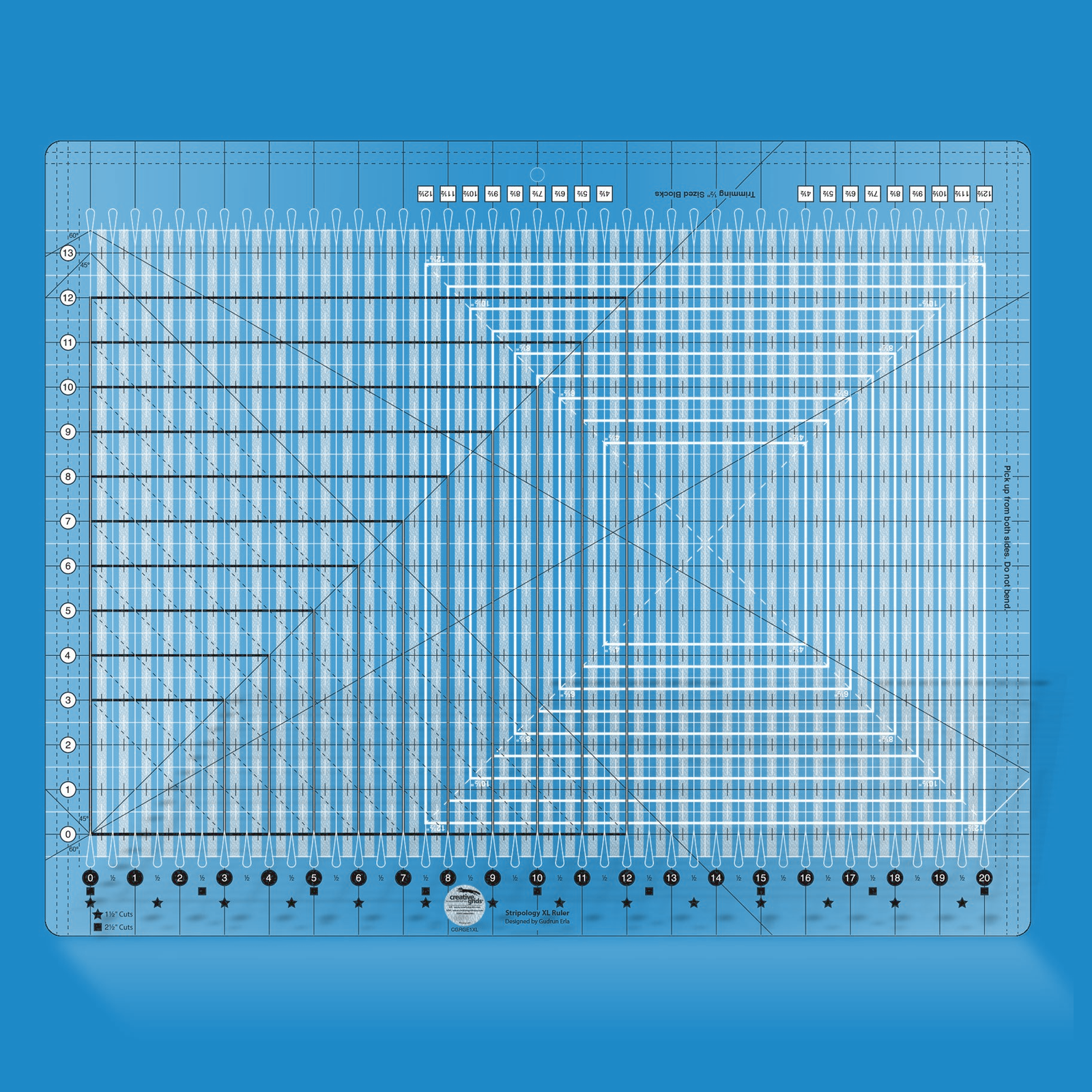 Stripology XL quilt ruler by Gudrun Erla for Creative Grids shown in translucent blue acrylic, highlighting the slotted cutting channels, star and square quick-reference markings for 1 1/2 inch and 2 1/2 inch strips, and the non-slip grip surface of the 17 3/4 x 22 inch ruler.