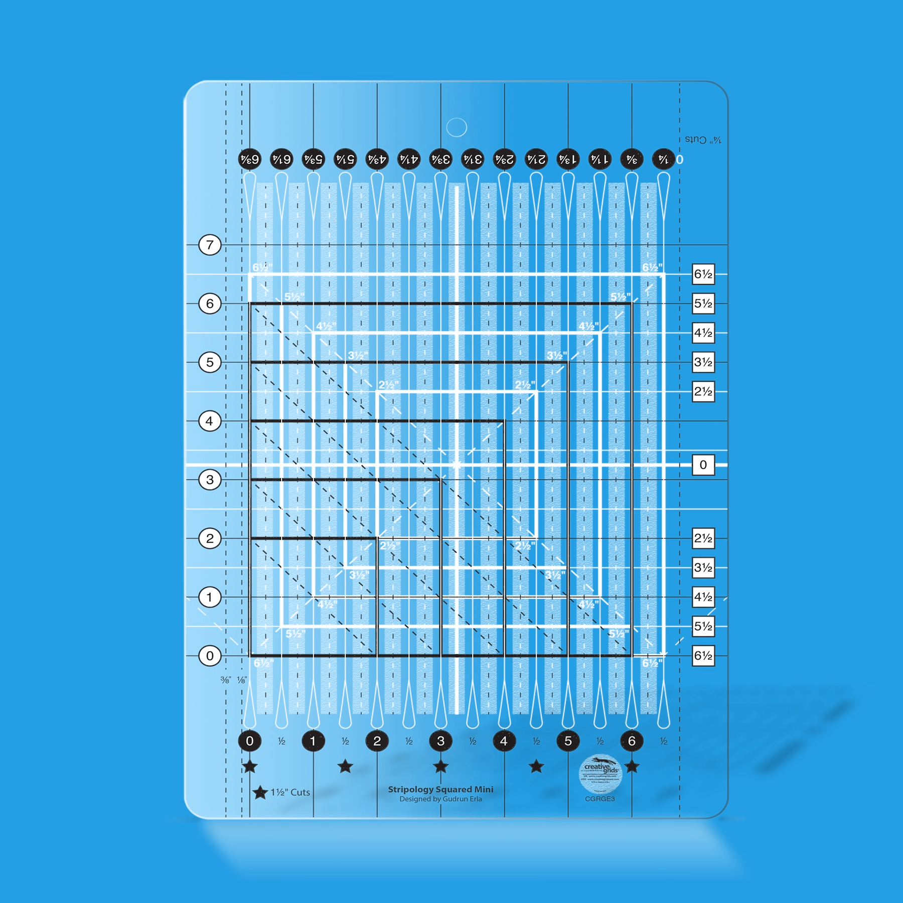 Stripology Squared Mini quilt ruler by Gudrun Erla for Creative Grids shown in translucent blue acrylic, highlighting the cutting slits, block-squaring guides, and non-slip grip surface of the 8 1/2 x 12 1/2 inch ruler.
