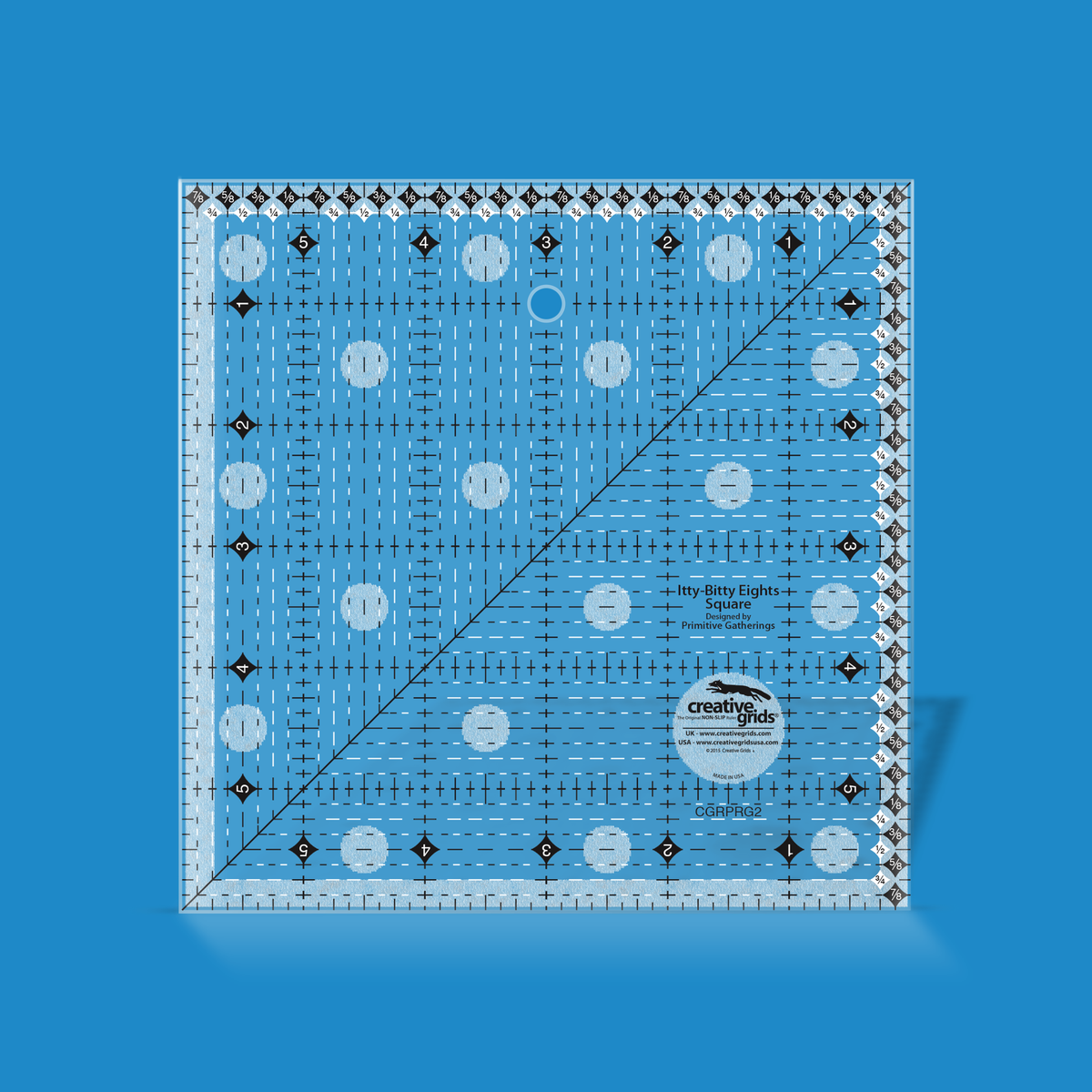 Creative Grids Itty-Bitty Eights 6 x 6 inch square quilt ruler CGRPRG2 by Lisa Bongean rendered in translucent blue acrylic with black and white dashed eighth-inch lines, a 45 degree diagonal, numbered black diamonds on all four sides, fraction diamonds along two edges, and the Creative Grids non-slip logo.