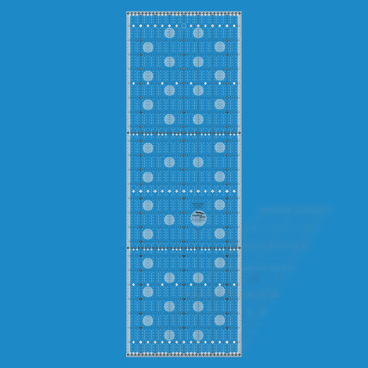 Creative Grids Itty-Bitty Eights XL 8 x 24 inch rectangle quilt ruler CGRPRG5 by Lisa Bongean rendered in translucent blue acrylic with black and white dashed eighth-inch lines, numbered black diamonds in three columns, fraction rows at both ends and across the middle, and the Creative Grids non-slip logo.