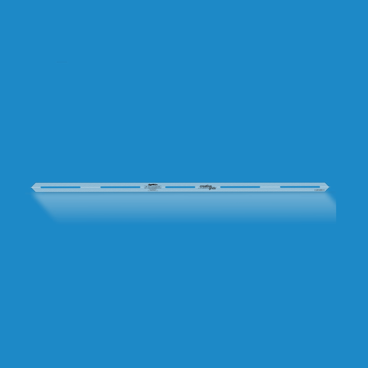 Creative Grids 15-Inch Seam Guide Tool CGRSMN15 by It's Sew Emma in translucent blue acrylic, a narrow strip with pointed ends, five marking slots along the center, and the Creative Grids logo.