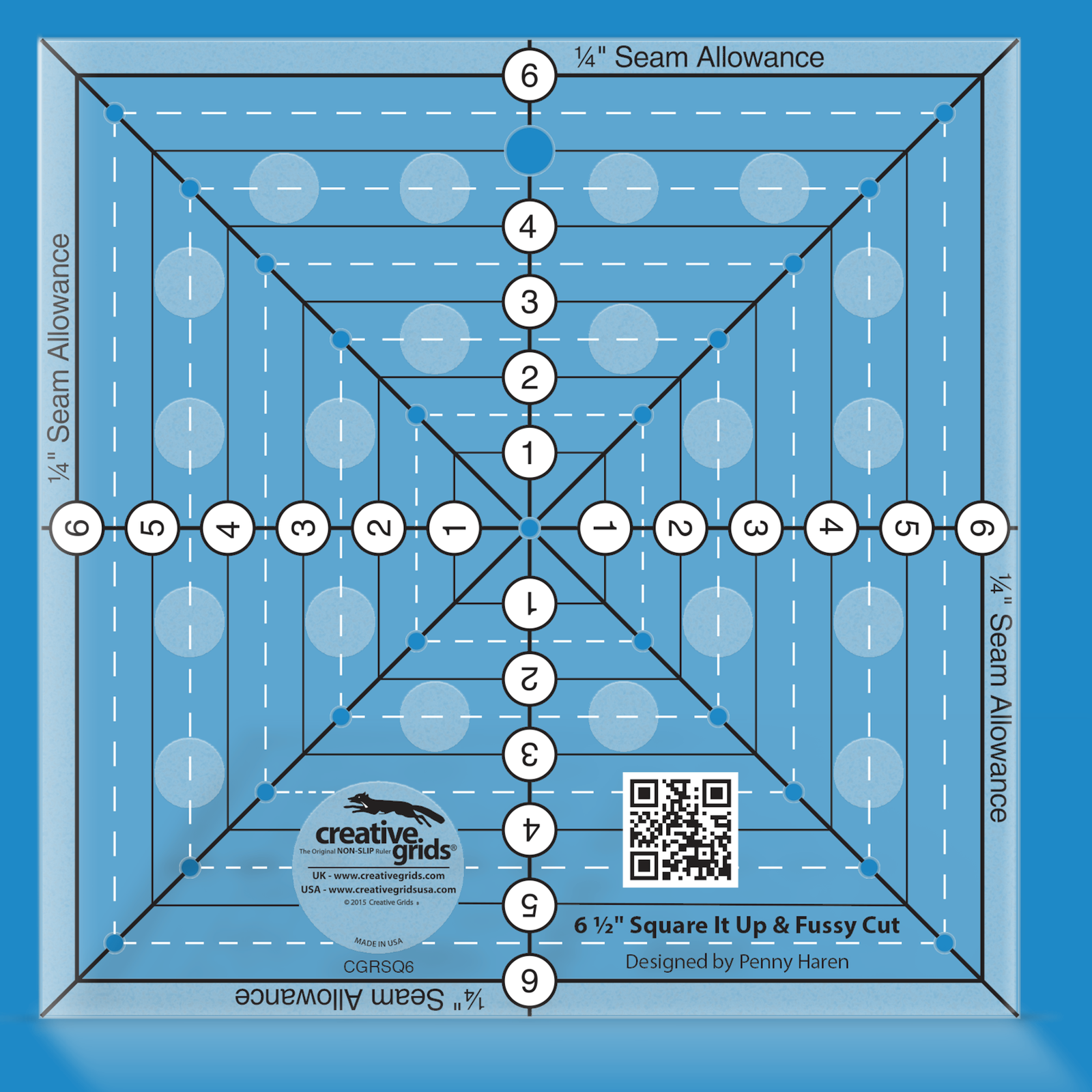 Creative Grids 6-1/2in Square It Up or Fussy Cut Square quilt ruler by Penny Haren in Smartisans brand blue. Same square acrylic ruler showing the centered horizontal, vertical, and diagonal lines, quarter-inch seam-allowance edges, printed 1in solid squares, and drilled marking holes used to square up blocks and fussy cut motifs. Item CGRSQ6.