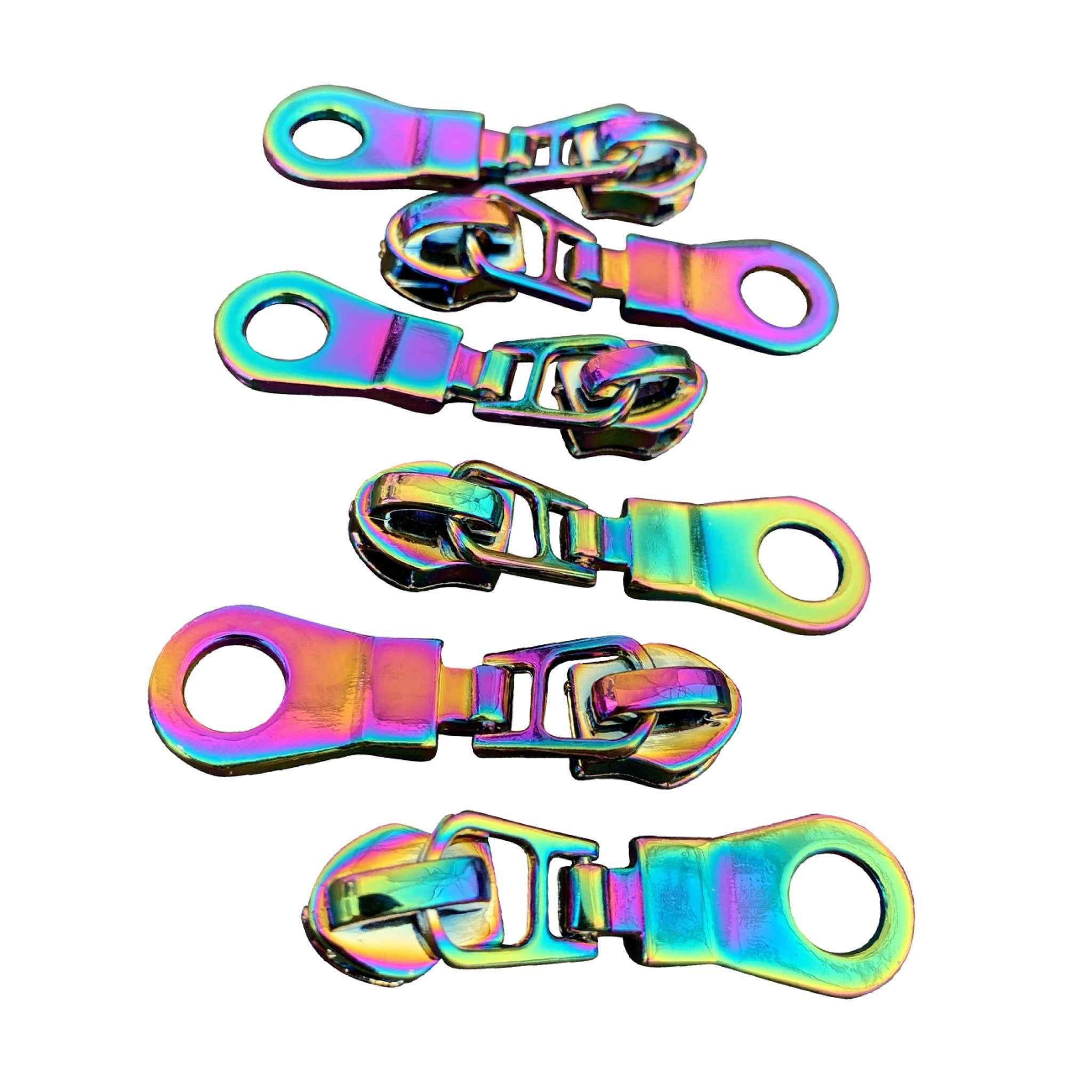 Six iridescent rainbow donut-hole zipper pulls from Sassafras Lane Designs shown out of the package. Pack of 6, fits #5 nylon coil zipper tape, oil-slick finish on slider body and round tab.