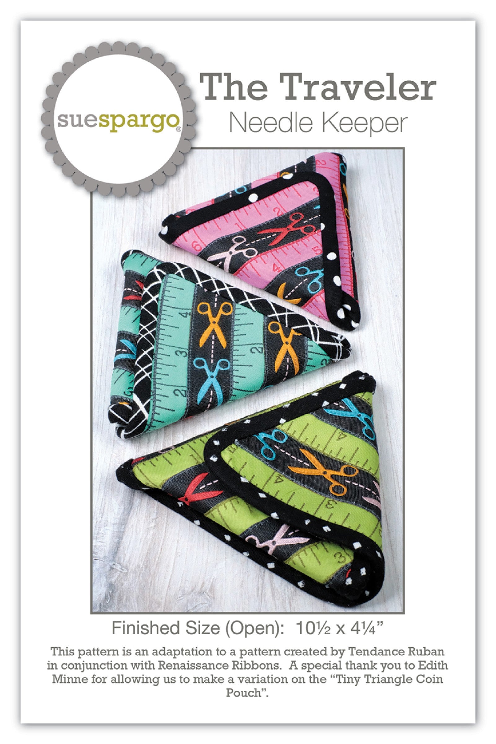 The Traveler Needle Keeper sewing pattern by Sue Spargo of Folk Art Quilts. Front cover shows three finished triangular fold-up needle keepers made from striped scissor-and-ruler print ribbons bound in black-and-white prints, in pink, teal, and green colorways. Finished size 10-1/2 by 4-1/4 inches open.