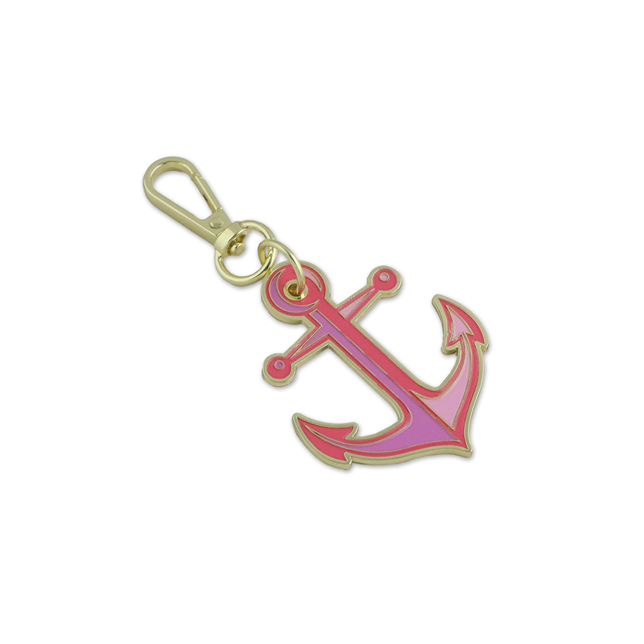 Tula Pink Anchors Aweigh Coralline hard enamel bag charm by Sallie Tomato – anchor shape in warm coral and soft pink, gold metal finish, and gold lobster clasp