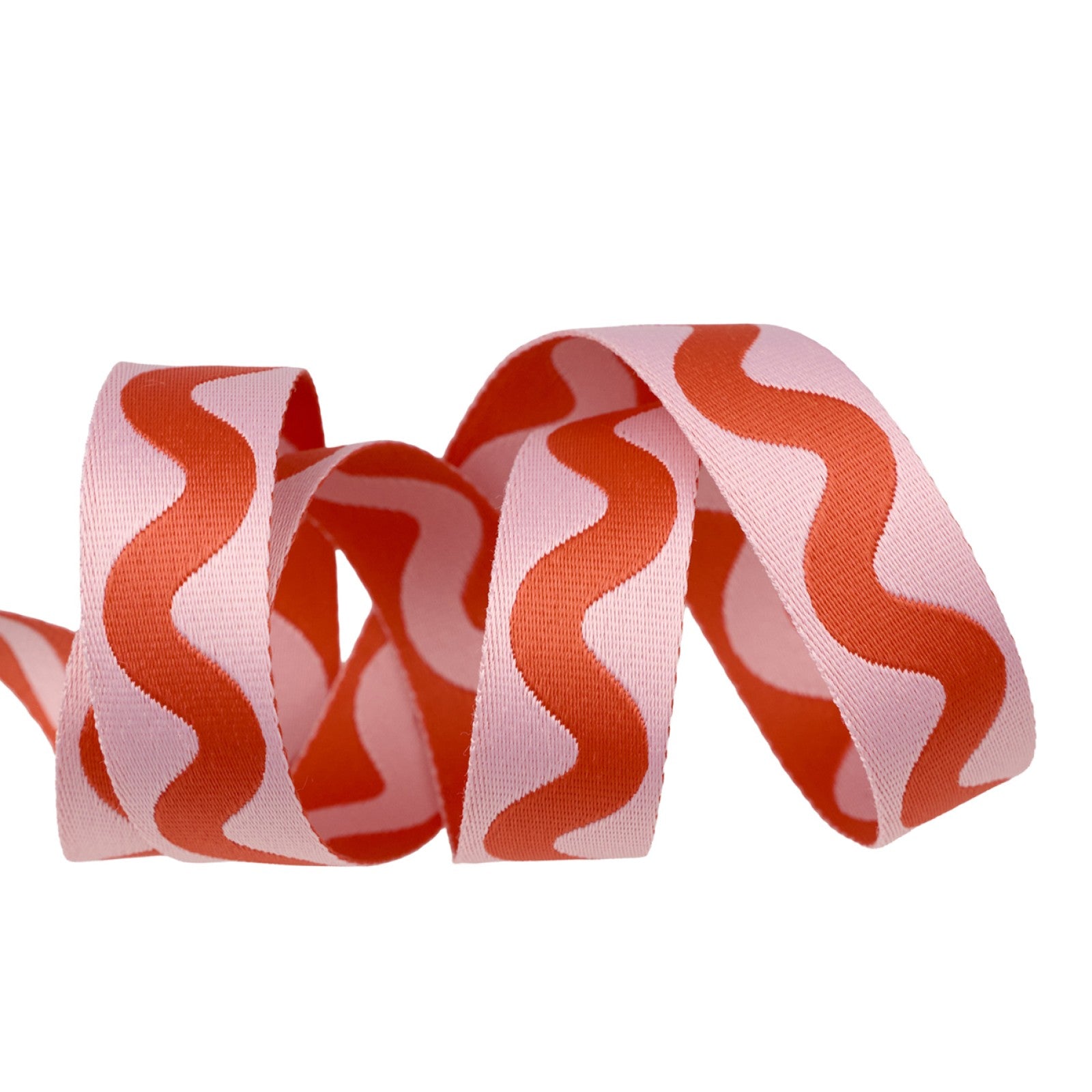 Tula Pink Floral Reef Lil Squiggle webbing in Coralline from Renaissance Ribbons, a 1 inch woven polyester strap twisting on white to show a coral squiggle on pale pink and the reverse, pink on coral.