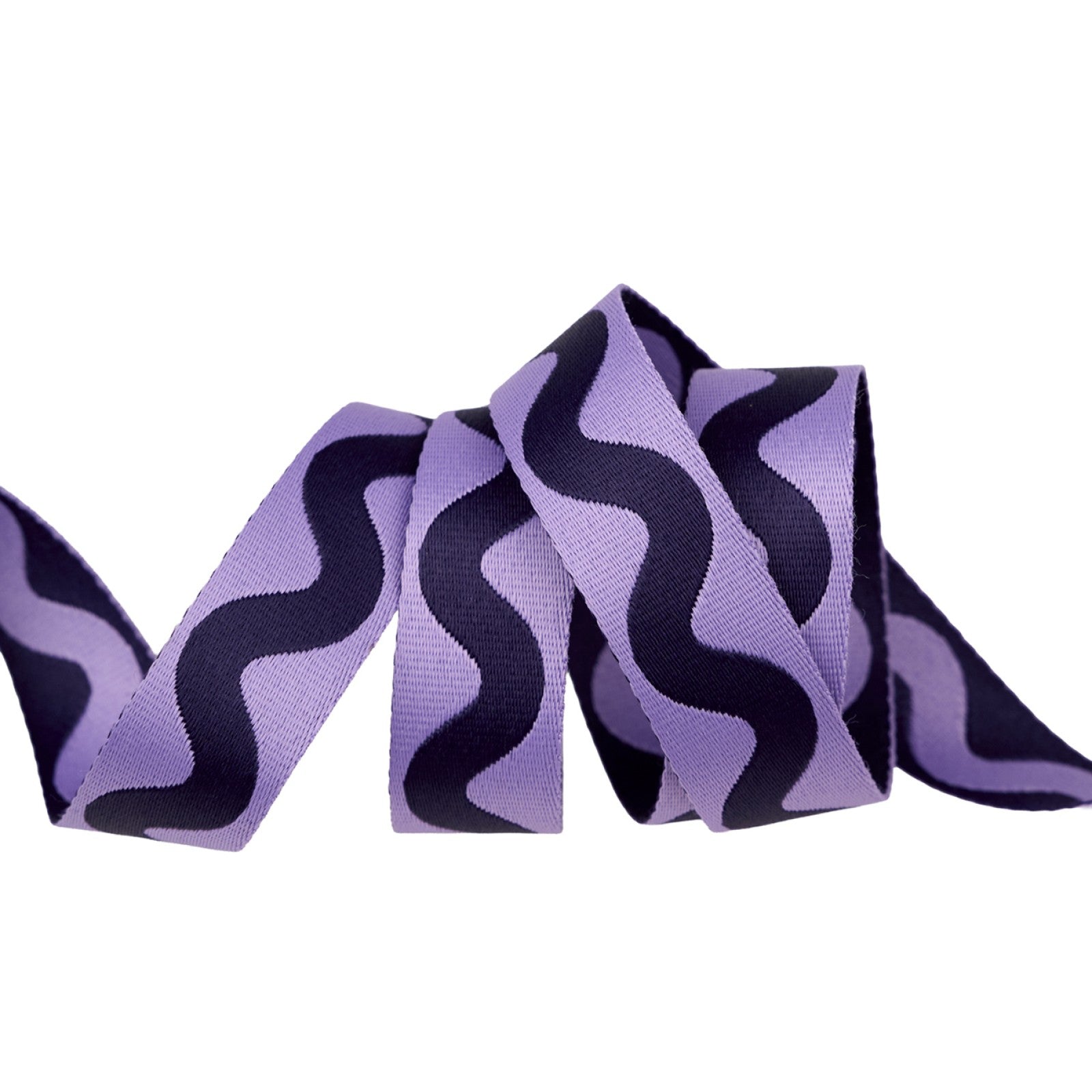 Tula Pink Floral Reef Lil Squiggle webbing in Ultraviolet from Renaissance Ribbons, a 1 inch woven polyester strap twisting on white to show a deep aubergine squiggle on lavender and the reverse, lavender on aubergine.