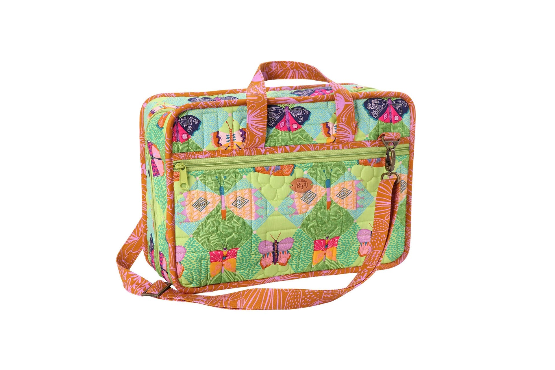 An A Place for Everything organizer bag closed in a cactus print, with handles and an adjustable strap.