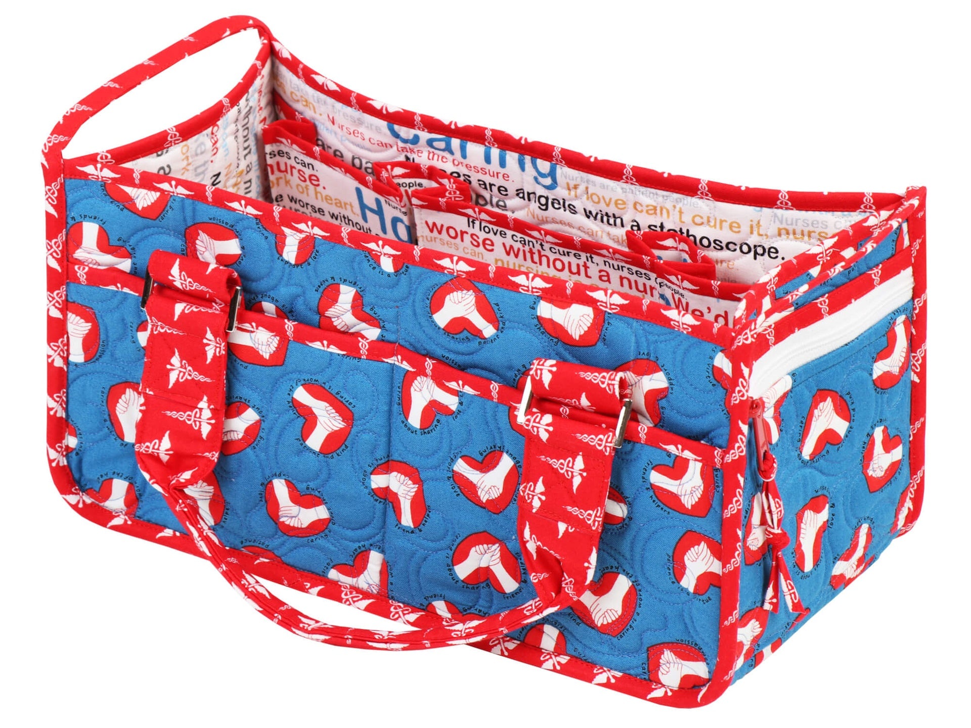 Catch All Caddy 2.0 in a red, white, and blue print shown empty from above, showing the open top, interior dividers, the zippered end pocket, and elastic loops along the exterior.